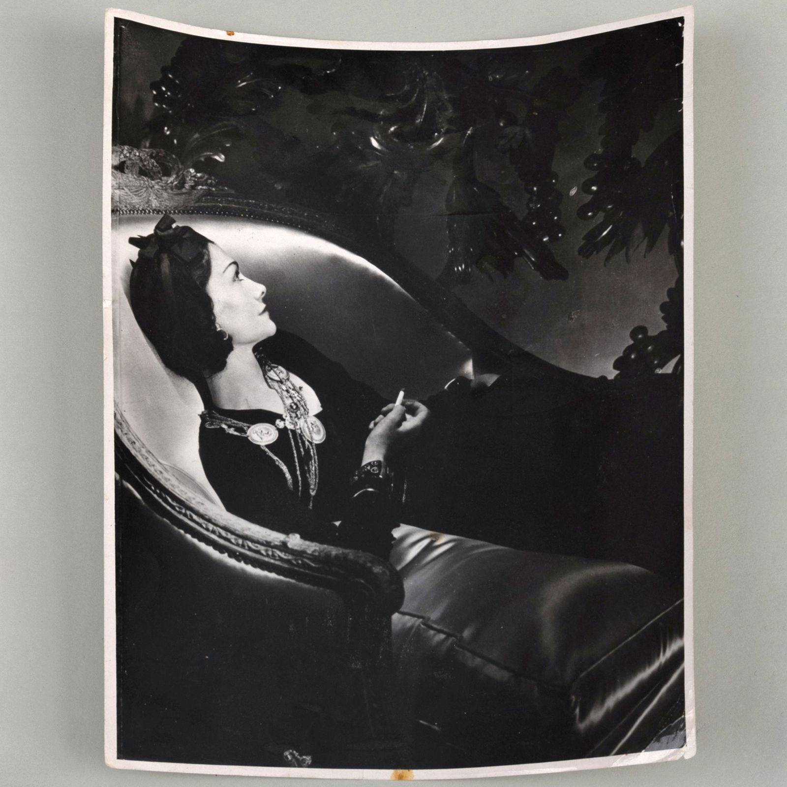 20th Century School: Coco Chanel: 20th Century School: Coco Chanel Black and white photograph, titled and variously inscribed and stamped on the reverse. 8 1/4 x 6 1/4 in. (sheet, unframed.)