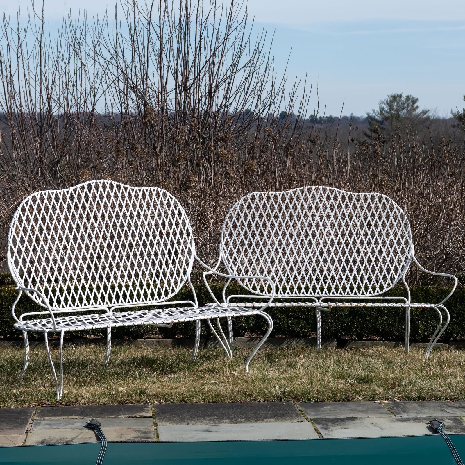 Pair of Painted Faux Bois Cast Iron Garden Settees: Pair of Painted Faux Bois Cast Iron Garden Settees 45 1/2 in.x 5 ft. 1 in. x 27 1/2 in.,seat height 15 in., seat depth 25 1/2 in. Please note that this lot is available for preview at 83 Old Lane, Cla