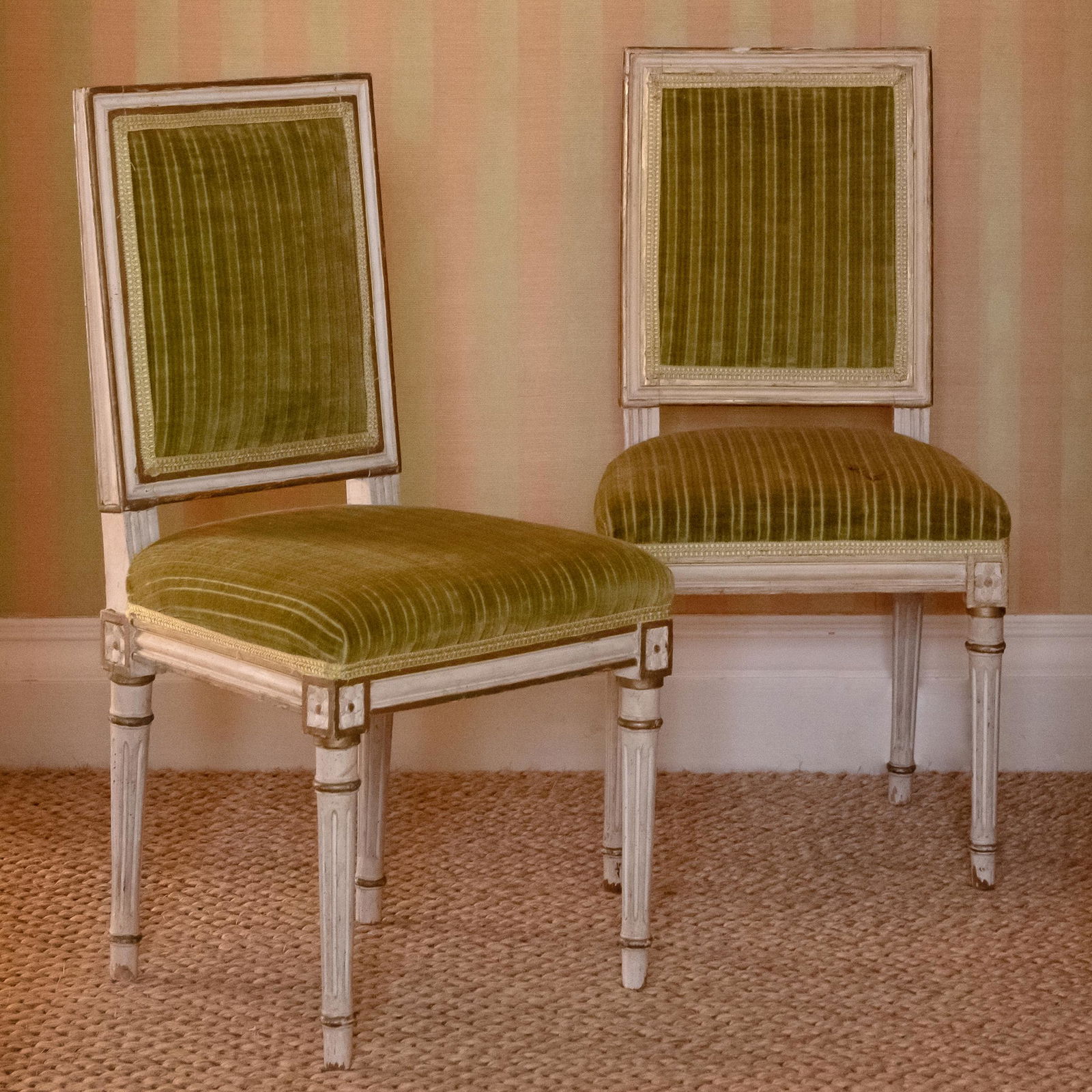 Pair of Diminutive Louis XVI Style Painted and Parcel-Gilt Chaises: Pair of Diminutive Louis XVI Style Painted and Parcel-Gilt Chaises 26 1/2 x 13 x 12 1/4 in., seat height 13 in. The Collection of Susie Hilfiger at Denbigh Farm