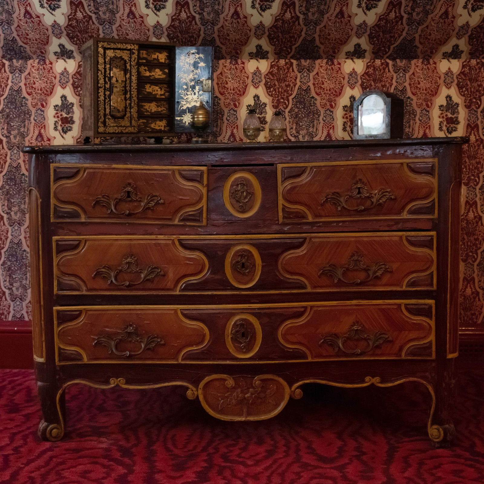 Regence Gilt-Metal-Mounted Faux Bois Painted Commode: Regence Gilt-Metal-Mounted Faux Bois Painted Commode 34 x 48 x 22 in. The Collection of Susie Hilfiger at Denbigh Farm