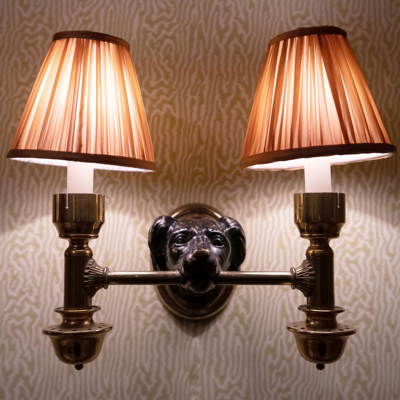 Pair of Brass and Black Painted Metal Dog Head Two-Light Sconces (1 of 3)