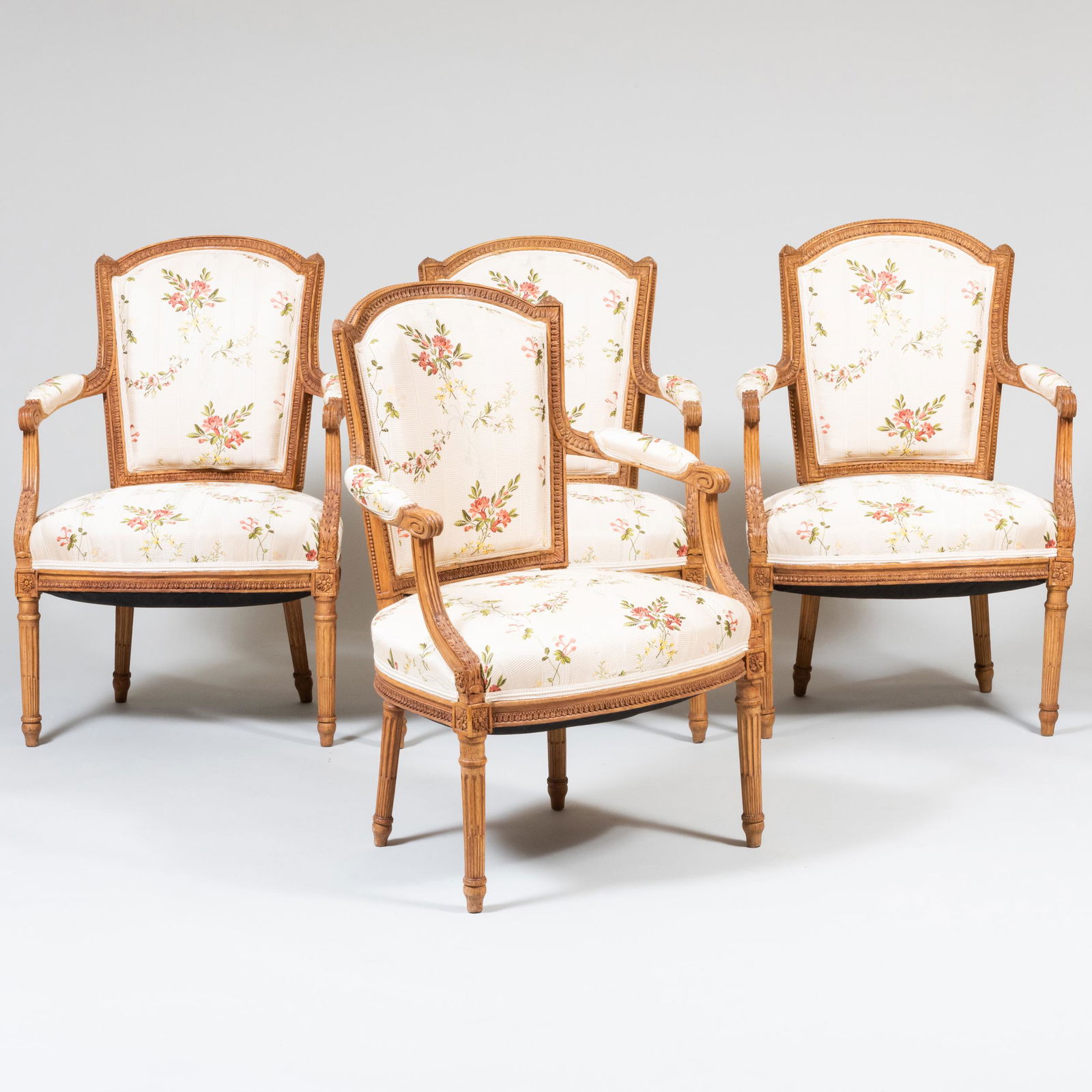 A Set of Four Louis XVI Upholstered Beechwood Fauteuils en Cabriolet (1 of 7)