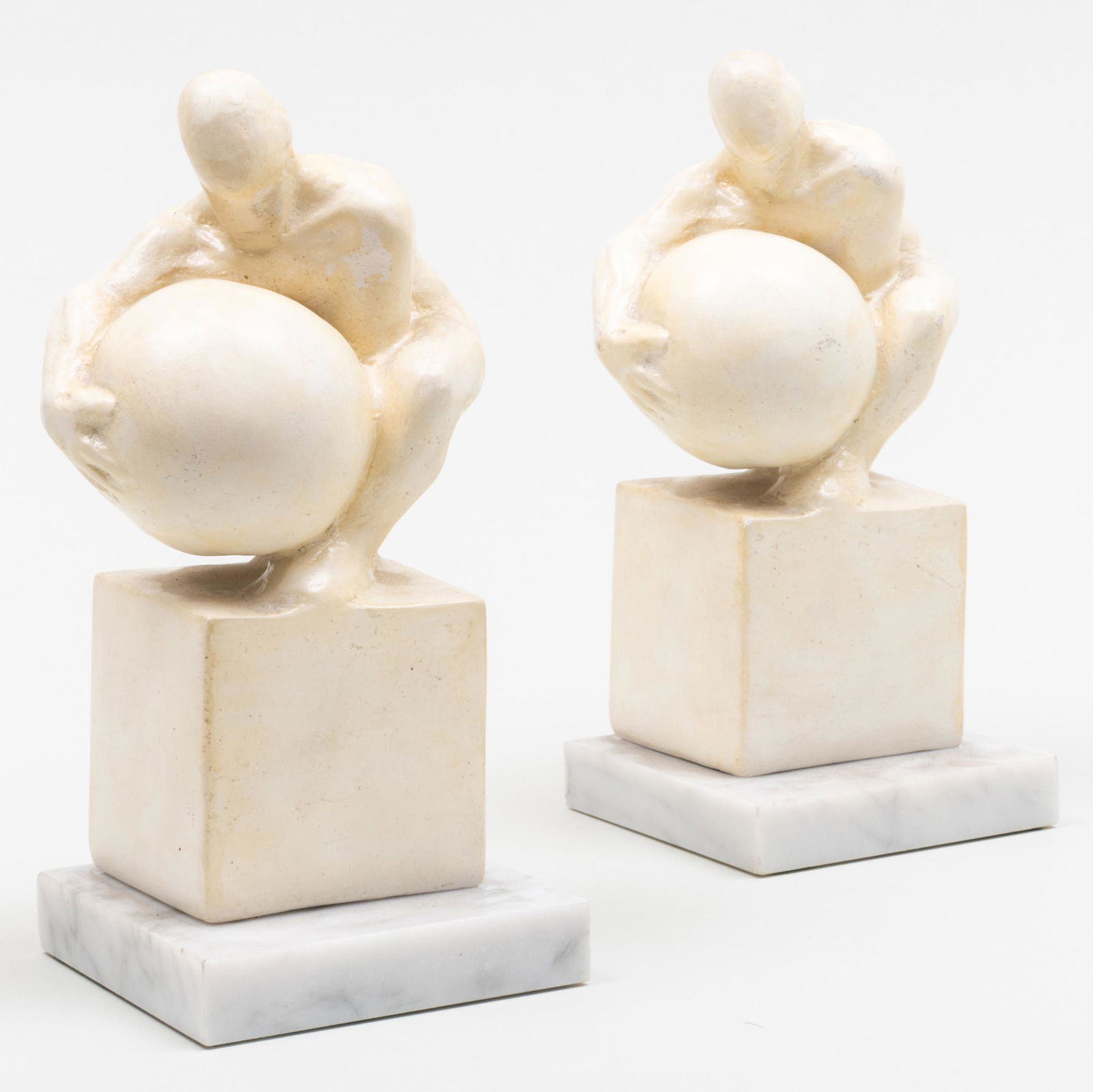 Tom Otterness (b. 1952): Bookends: A Pair: Tom Otterness (b. 1952): Bookends: A Pair The pair of cast hydrocal on marble bases, 1979, unmarked, from the edition of unknown size (possibly 250). Both 9 in. (height with base).