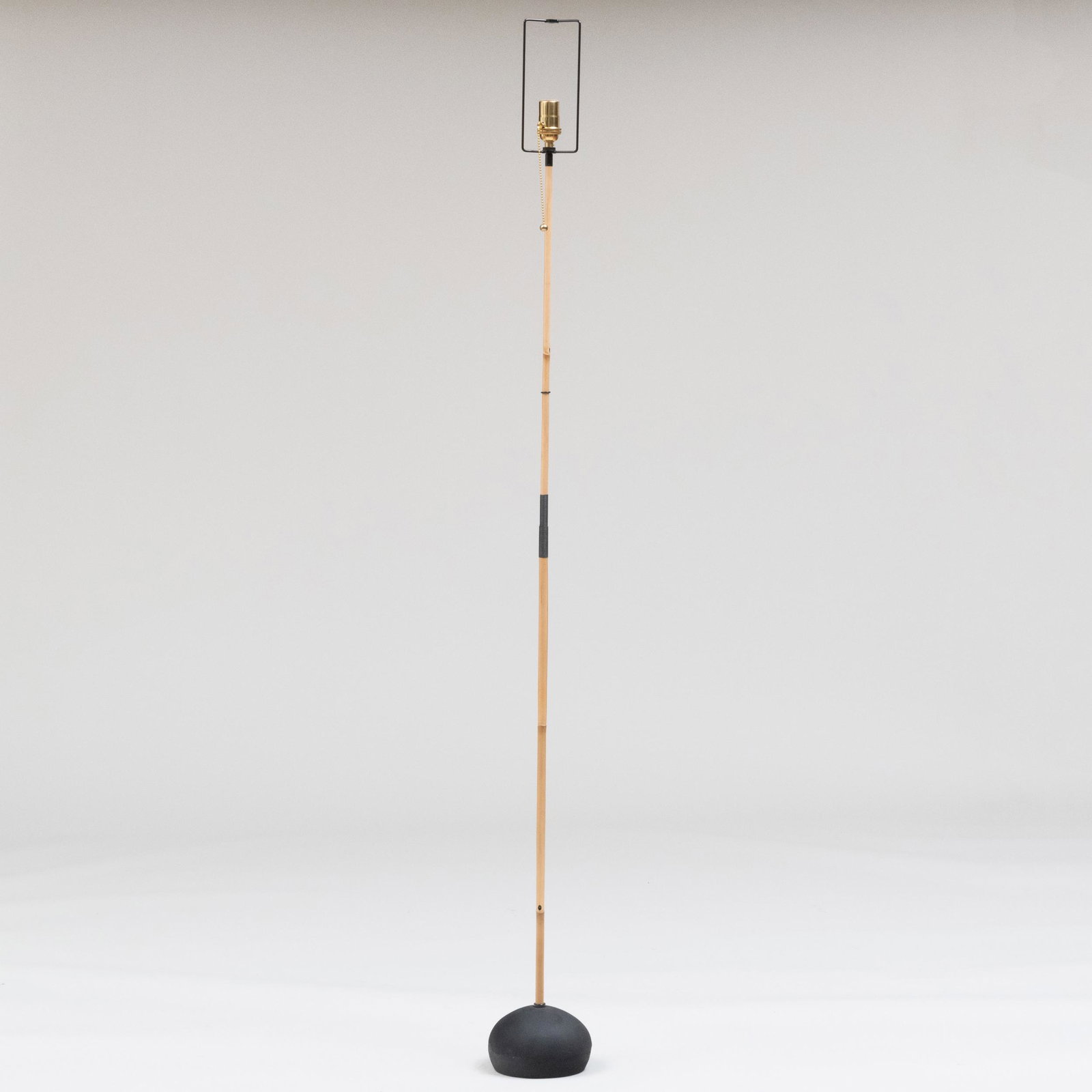 Isamu Noguchi for Vitra Bamboo and Resin 'Akari BB3-55DD' Floor Lamp: Isamu Noguchi for Vitra Bamboo and Resin 'Akari BB3-55DD' Floor Lamp Stamped on the underside of the base: 'MADE IN JAPAN'. 5 ft. 5 in. x 6 in. diam.