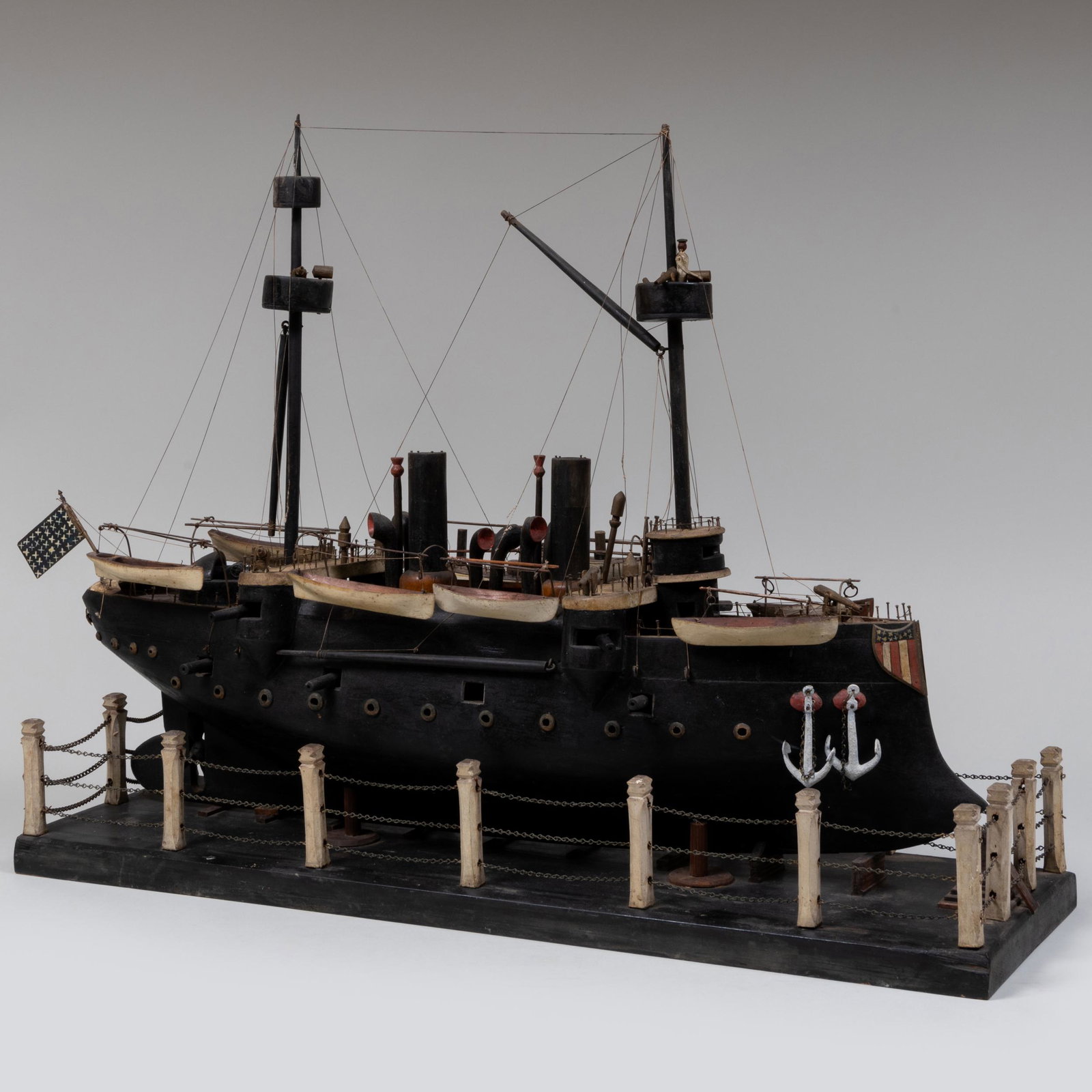 American Vintage Carved and Painted Model of a Colonial Steam Driven Two-Masted Warship: American Vintage Carved and Painted Model of a Colonial Steam Driven Two-Masted Warship With string rigging, seven lifeboats, one tender, canon and four lead anchors. Painted with a t