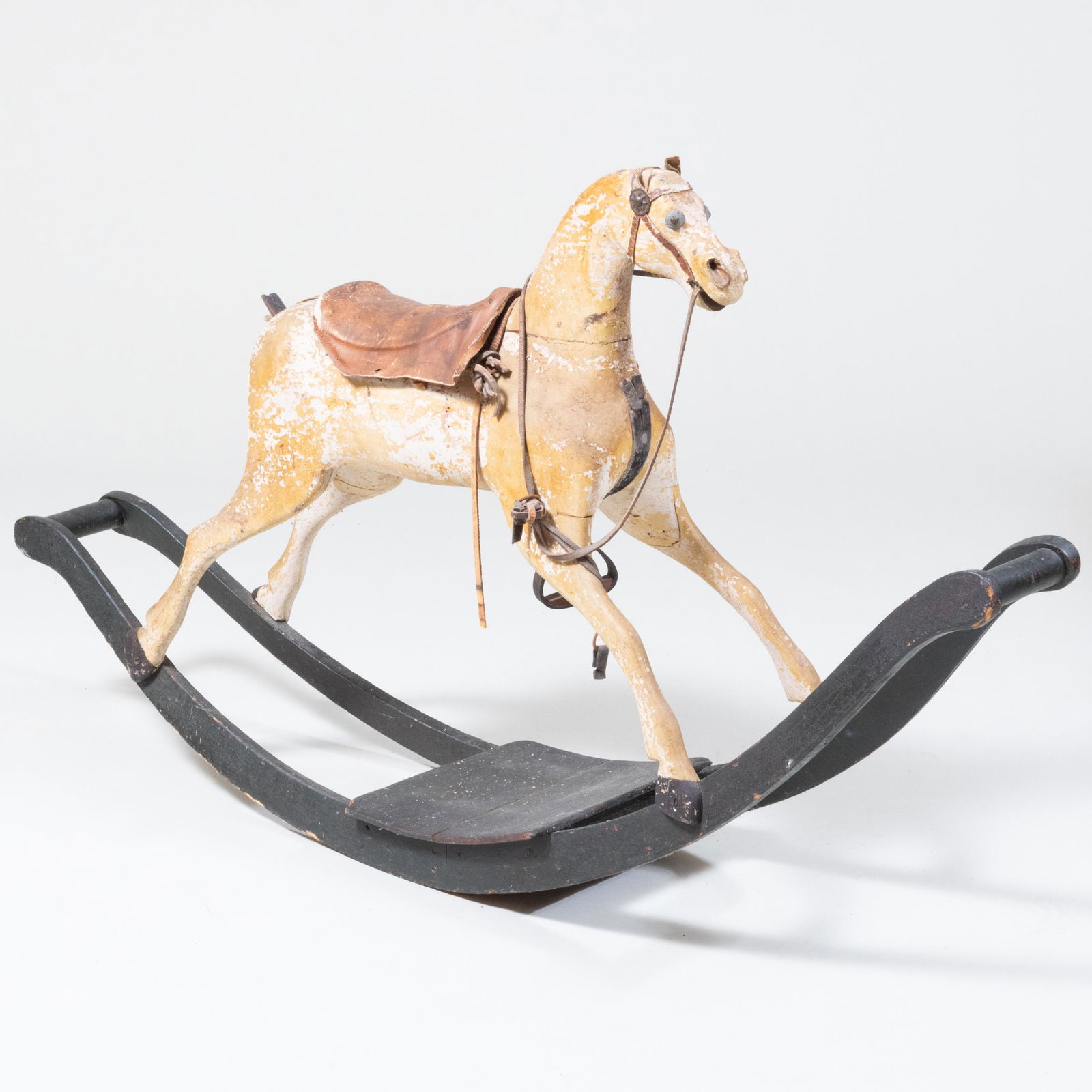 Victorian Carved and Painted Wood, Leather-Mounted Rocking Horse: Victorian Carved and Painted Wood, Leather-Mounted Rocking Horse 31 1/4 in. x 4 ft. 7 1/2 in. x 11 3/4 in.