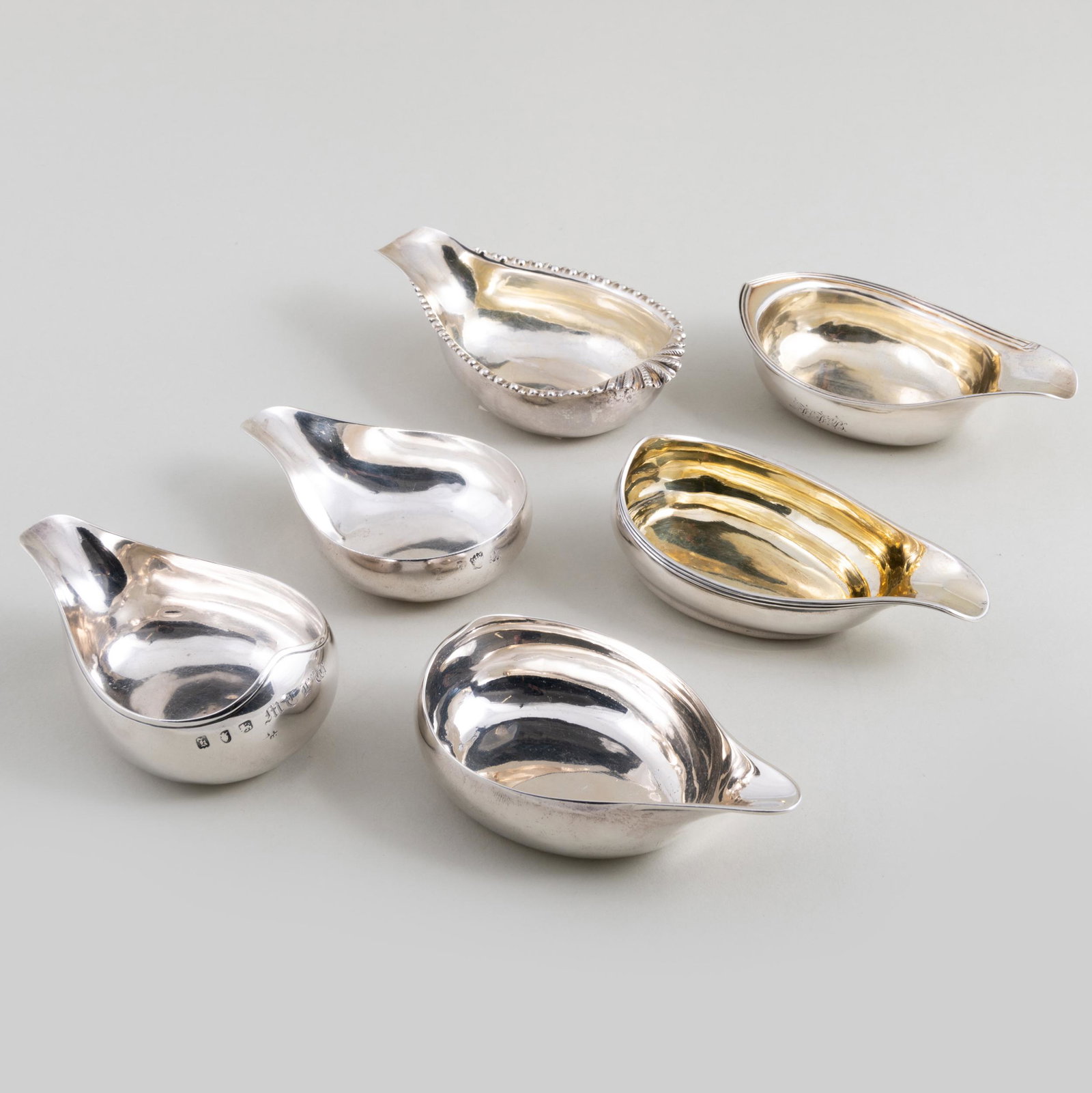 Group of Six English Silver Pap Boats: Group of Six English Silver Pap Boats Comprising: A George II boat monogrammed and marked London, 1736 A George II boat monogrammed and marked London, 1765 A George III boat marked London, 1767 A Geor