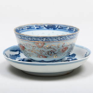 Chinese Blue and White Porcelain Saucer and a Bowl: Chinese Blue and White Porcelain Saucer and a Bowl Each with blue painted four character mark. The bowl 2 1/8 x 4 in. diam., the saucer 1 1/8 x 5 1/2 in. diam. The saucer with label for John Rosselli,