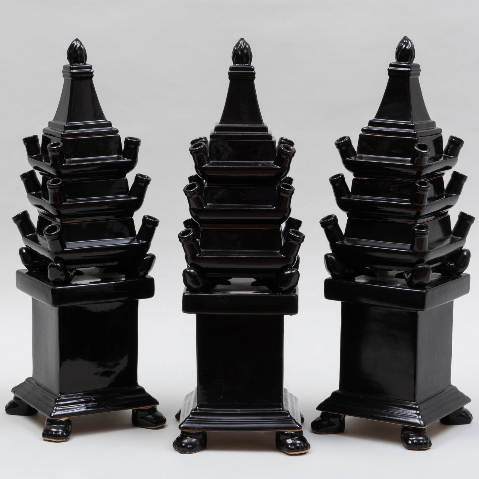 Group of Three Napa Home & Garden Black Glazed Tulipieres: Group of Three Napa Home & Garden Black Glazed Tulipieres Black printed mark; each in three sections and with cover. 24 1/2 x 8 x 8 in. The Collection of Andre Leon Talley