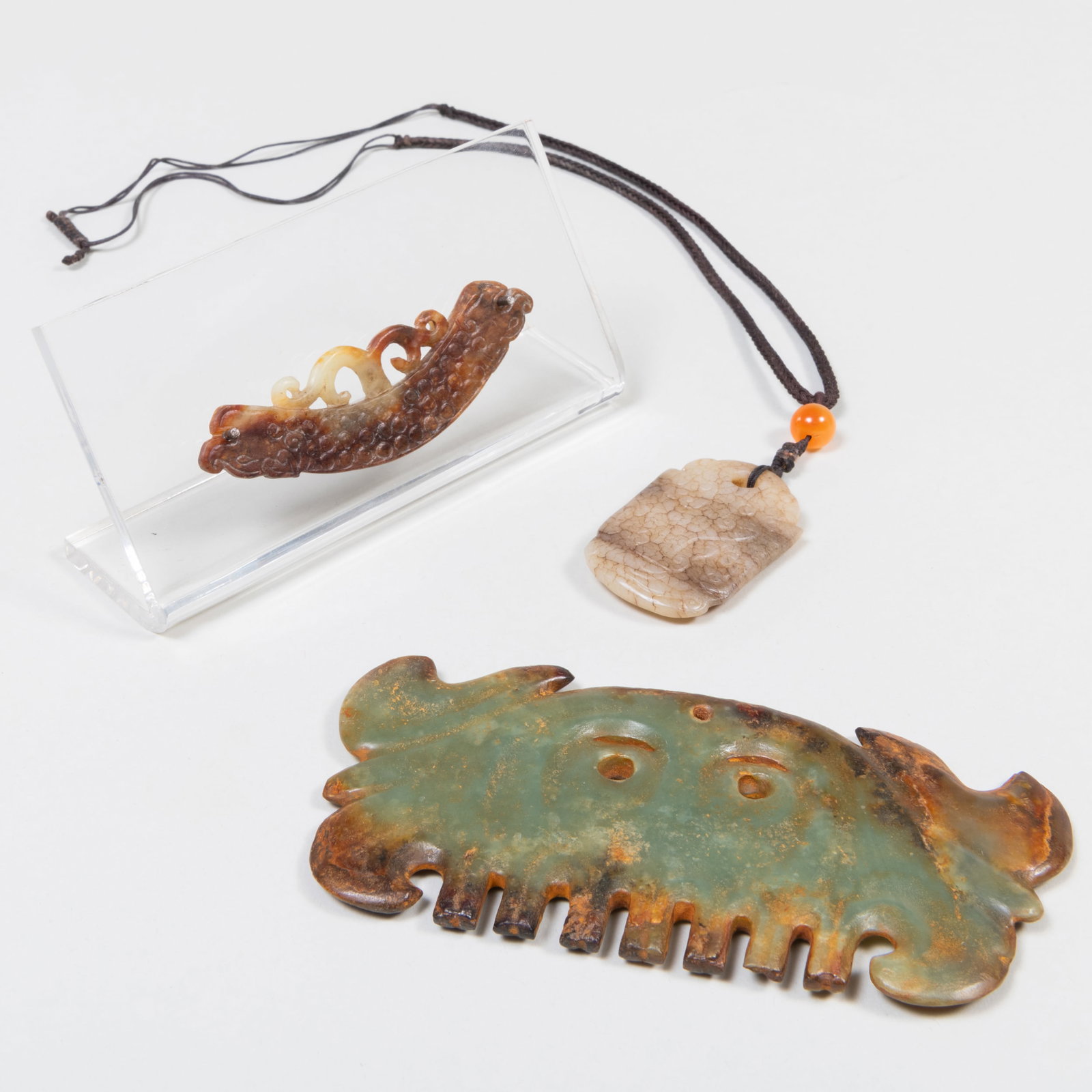 Two Chinese Archaistic Pendants and a Comb (1 of 5)