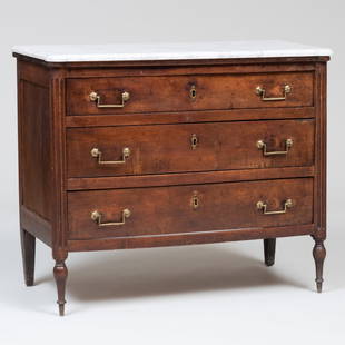 Late Louis XVI Provincial Brass-Mounted Mahogany Commode: Late Louis XVI Provincial Brass-Mounted Mahogany Commode Fitted with a molded marble top with rounded corners. 33 x 39 x 18 1/2 in. The Collection of a Rockefeller Family's Parish-Hadley Designed Home