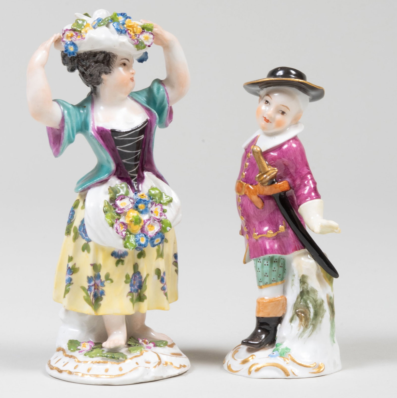 Two Meissen Porcelain Figures: Two Meissen Porcelain Figures Each with blue crossed sword mark. The taller 5 1/2 in. high.