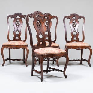 Set of Four Dutch Rococo Style Carved Mahogany Side Chairs: Set of Four Dutch Rococo Style Carved Mahogany Side Chairs 43 1/2 x 22 1/2 x 23 1/4 in., seat height 18 in.