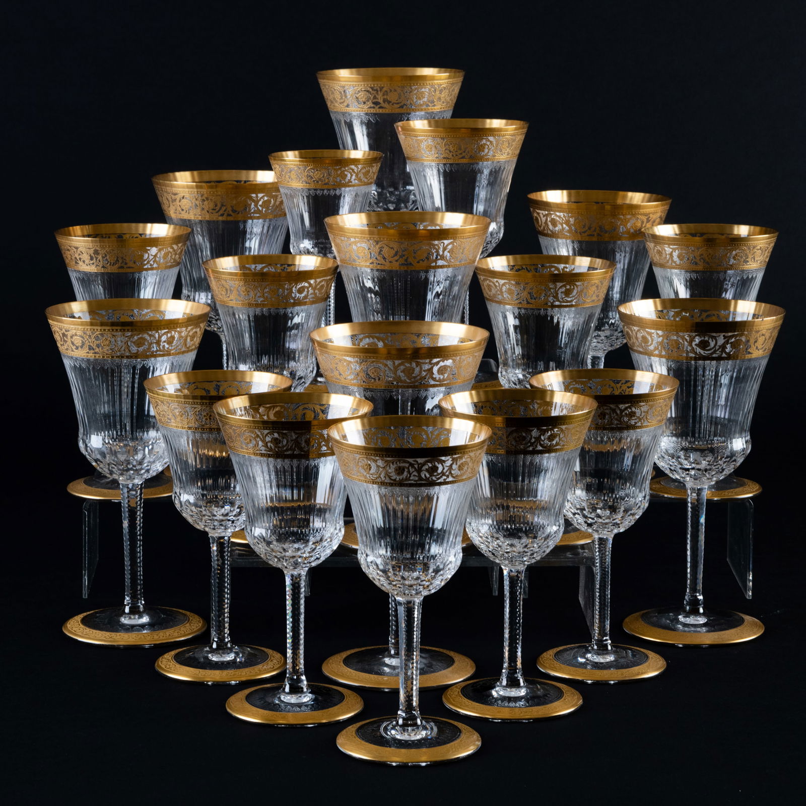 St. Louis Gilt Decorated Part Stemware Service in the 'Thistle Gold' Pattern: St. Louis Gilt Decorated Part Stemware Service in the 'Thistle Gold' Pattern Comprising: Six water goblets A red wine glass Twelve white wine glasses A sherry glass The goblets 7 1/2 x 3 3/4 in. diam.