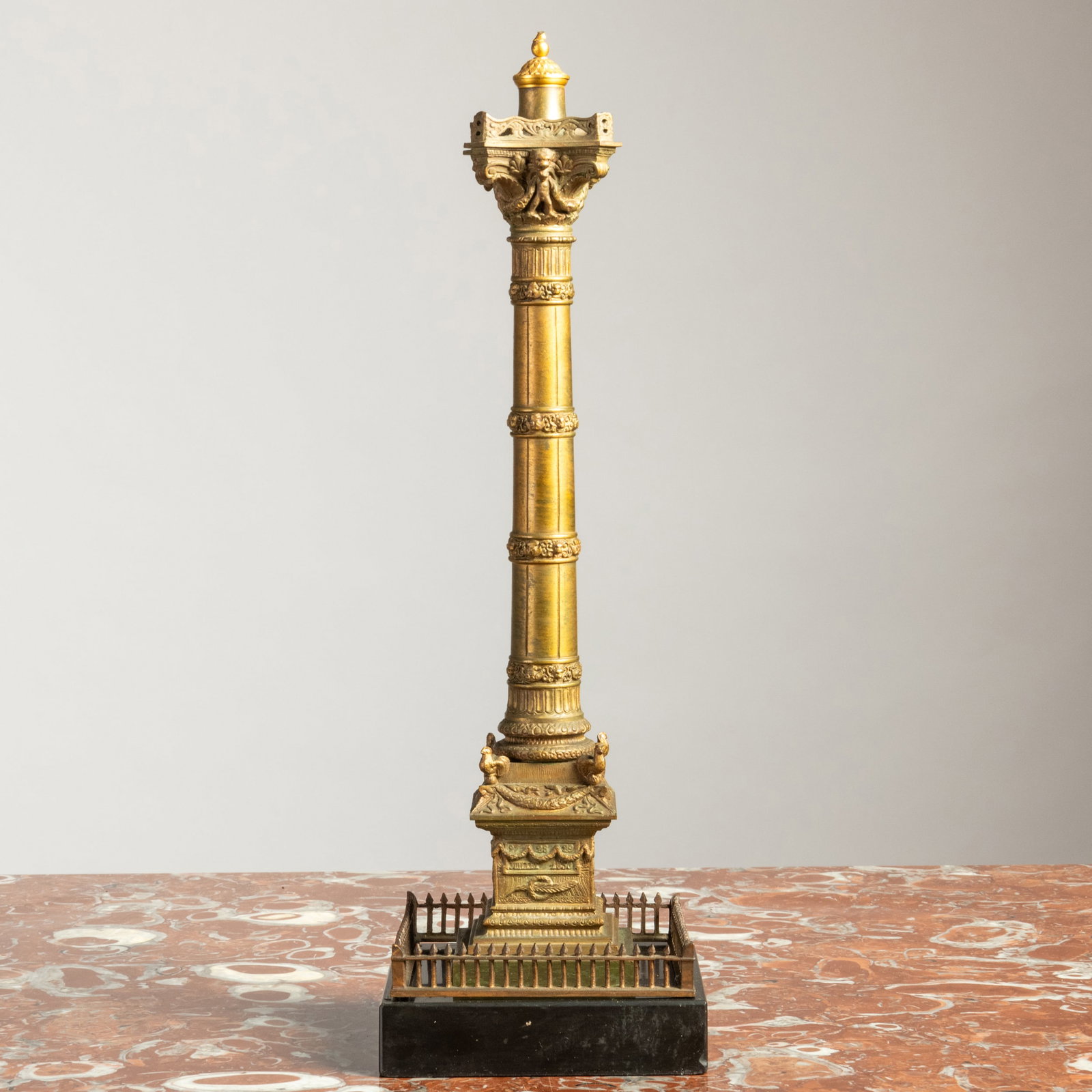 Grand Tour Gilt-Metal Model of a Column on a Black Marble Base: Grand Tour Gilt-Metal Model of a Column on a Black Marble Base 14 1/4 x 4 1/2 x 4 1/2 in. The Collection of Niall Smith. Property from the Collection of Niall Smith