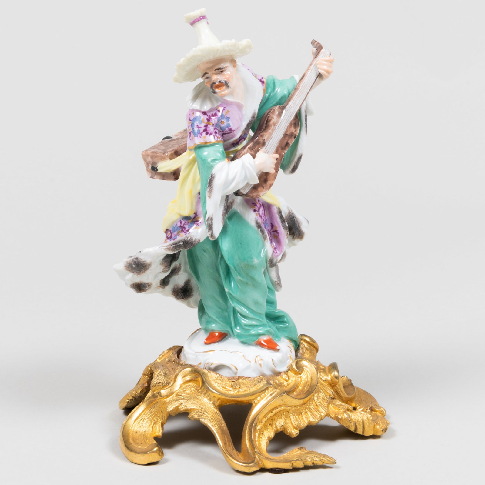 Meissen Ormolu-Mounted Chinoiserie Malabar Musician: Meissen Ormolu-Mounted Chinoiserie Malabar Musician Apparently unmarked. 8 1/2 x 5 1/2 x 5 in. Sold Christie’s, New York, The Art of Collecting: Three Private Collections, October 8, 