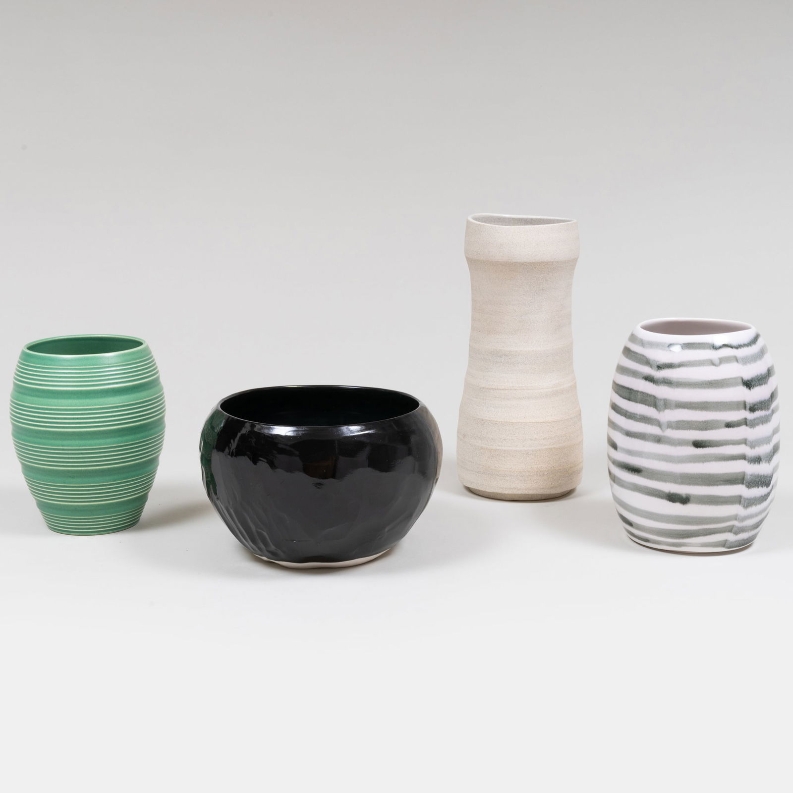 Keith Murray for Wedgwood Porcelain Vase and Three Contemporary Studio Vessels: Keith Murray for Wedgwood Porcelain Vase and Three Contemporary Studio Vessels The Wedgwood with black printed mark, the studio vessels indistinctly signed. The Wedgwood 6 1/2 x 5 in. diam., the large