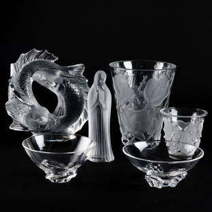 Group of Lalique Glass Wares: Group of Lalique Glass Wares Signed in etch. Comprising: A vase molded with roses A vase molded with leaves A twin fish sculpture A figure of the blessed virgin Together with two Steuben Glass bo