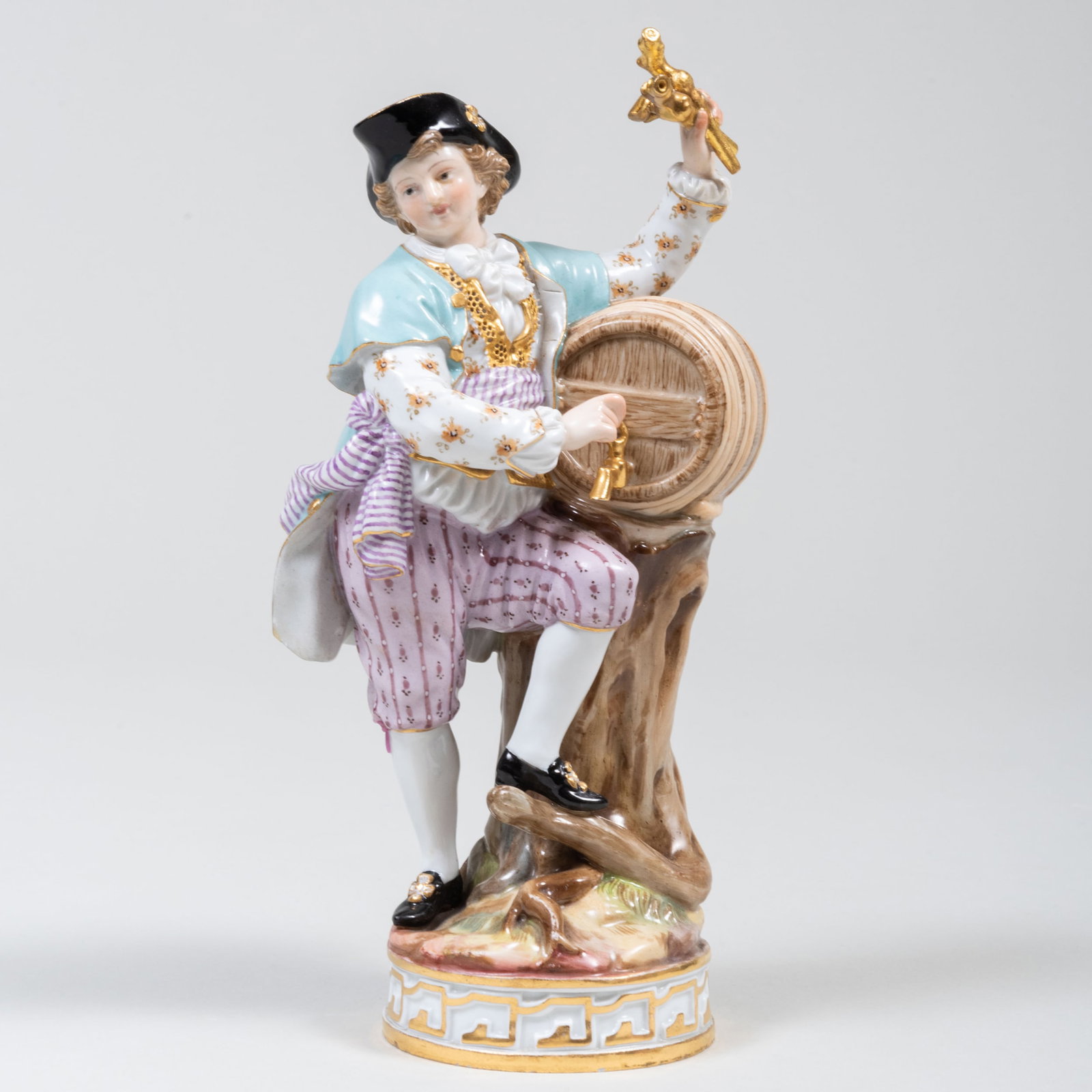 Meissen Porcelain Figure of a Vintner: Meissen Porcelain Figure of a Vintner Blue crossed sword mark. 7 1/4 x 3 3/4 x 2 1/2 in.