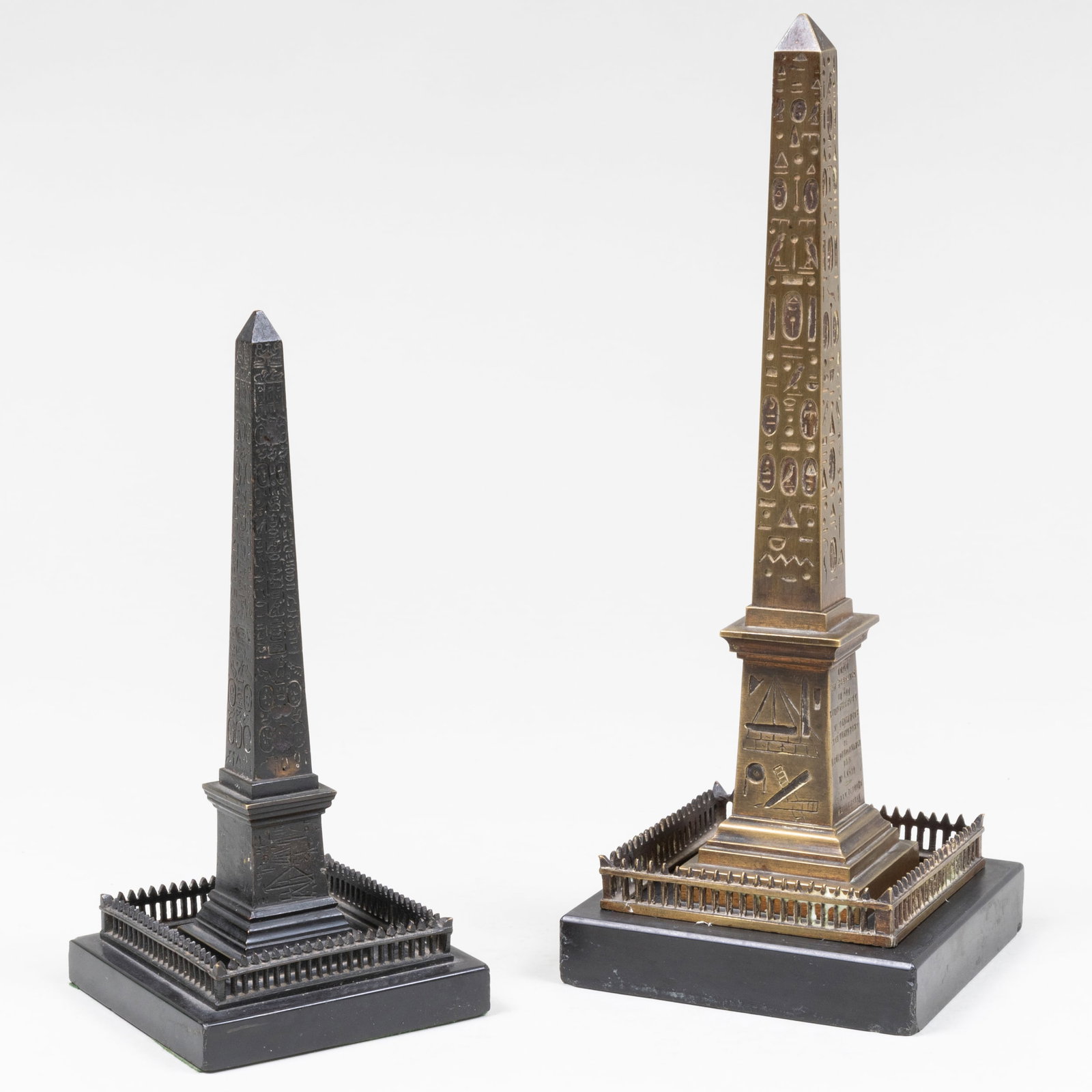 Two Bronze and Marble Luxor Obelisks: Two Bronze and Marble Luxor Obelisks The taller 10 3/4 x 4 1/8 x 4 1/8 in.