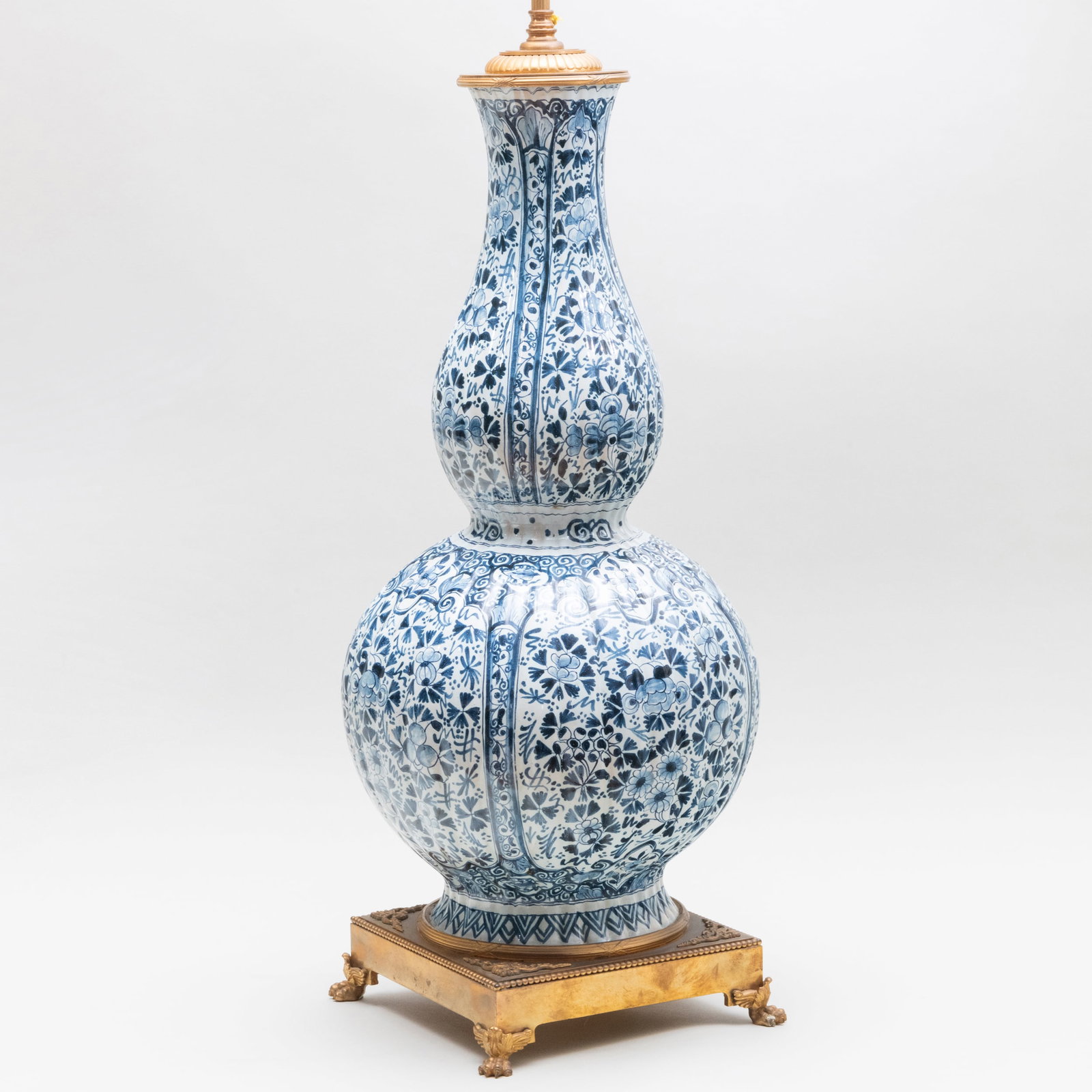 Delft Blue and White Double Gourd Vase Mounted as a Lamp: Delft Blue and White Double Gourd Vase Mounted as a Lamp 32 x 10 in. diam. (to socket). The Collection of Ann and Gordon Getty at STAIR: A Lifetime of Connoisseurship, Curiosity and Collecting Sold Ch