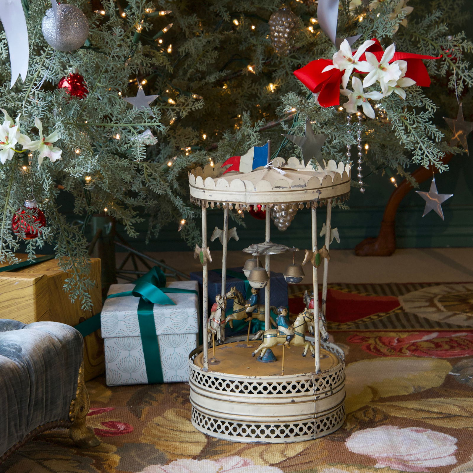 Gunthermann Printed Tin Toy Carousel and Another Carousel: Gunthermann Printed Tin Toy Carousel and Another Carousel The larger 14 x 8 in. diam., the smaller 6 3/4 x 5 3/4 in. diam. The smaller sold Sotheby's New York December 12, 1998, Lot 335. The