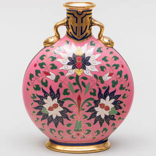 Christopher Dresser for Minton Pink Ground Porcelain Moon Flask: Christopher Dresser for Minton Pink Ground Porcelain Moon FlaskImpressed mark.7 3/4 x 5 3/4 x 2 1/2 in.Paul Reeves, London, 1995.The Collection of Ann and Gordon Getty. 