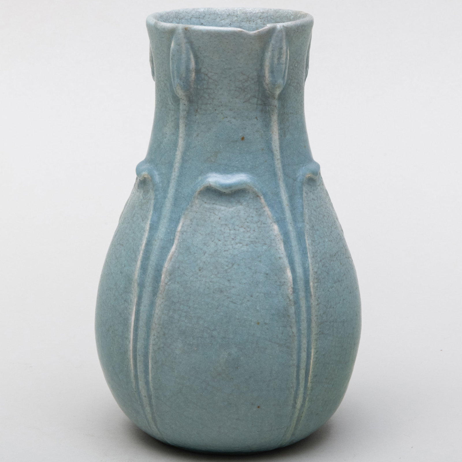 Vase Grueby Faience Company Pottery Vase: Vase Grueby Faience Company Pottery Vase Impressed and incised monogram mark. 7 1/4 x 4 1/2 in. diam. Isak Lindenauer Antiques, San Francisco, 1995. The Collection of Ann and Gordon Getty.