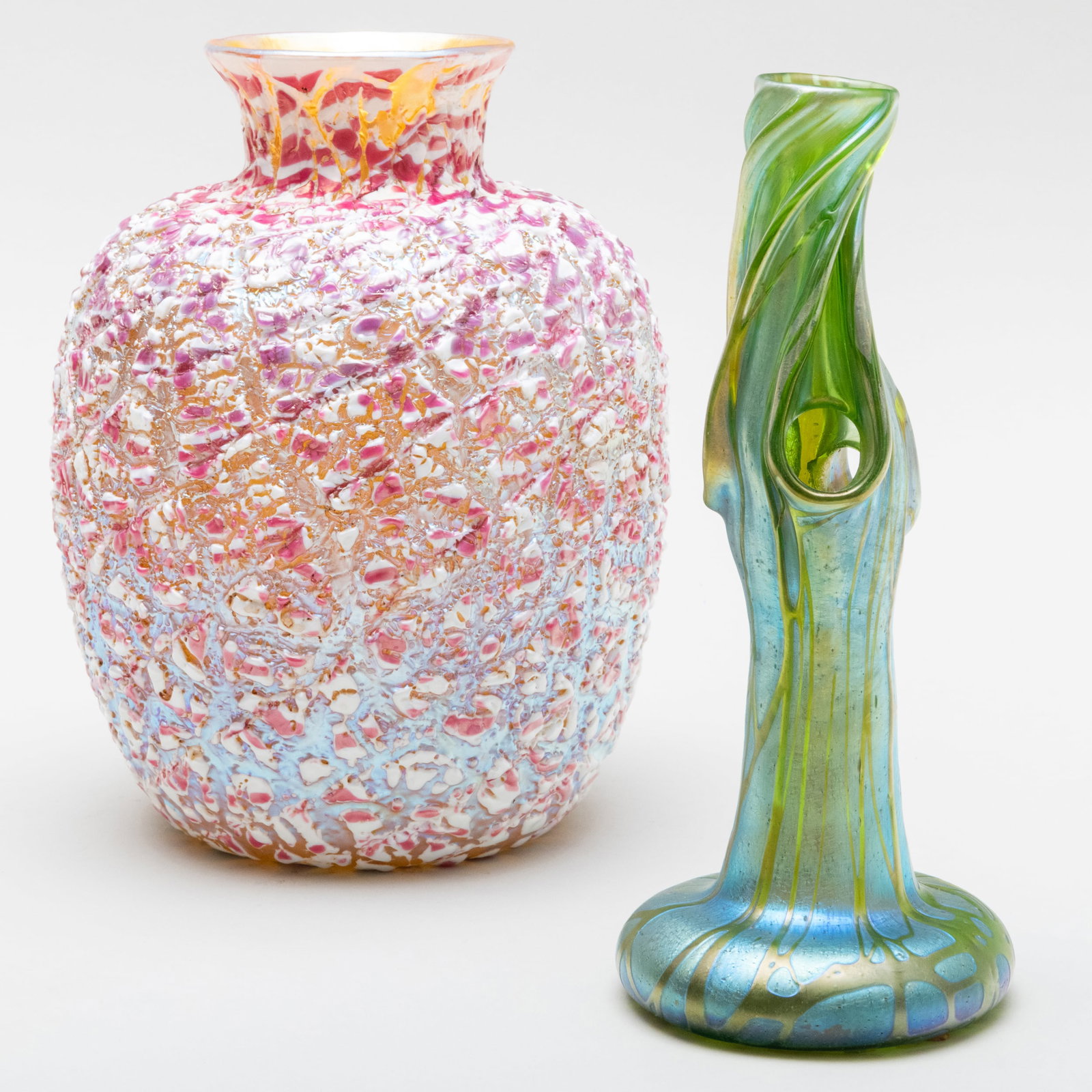 Durand Crackle Glass Vase and Loetz Glass Tree Form Vase: Durand Crackle Glass Vase and Loetz Glass Tree Form Vase Unmarked. The larger 9 x 6 1/4 in. diam., the smaller 9 1/4 x 4 in. diam. The Durand Sold Butterfield & Butterfield, May 21, 1996, Lot 3548. Th