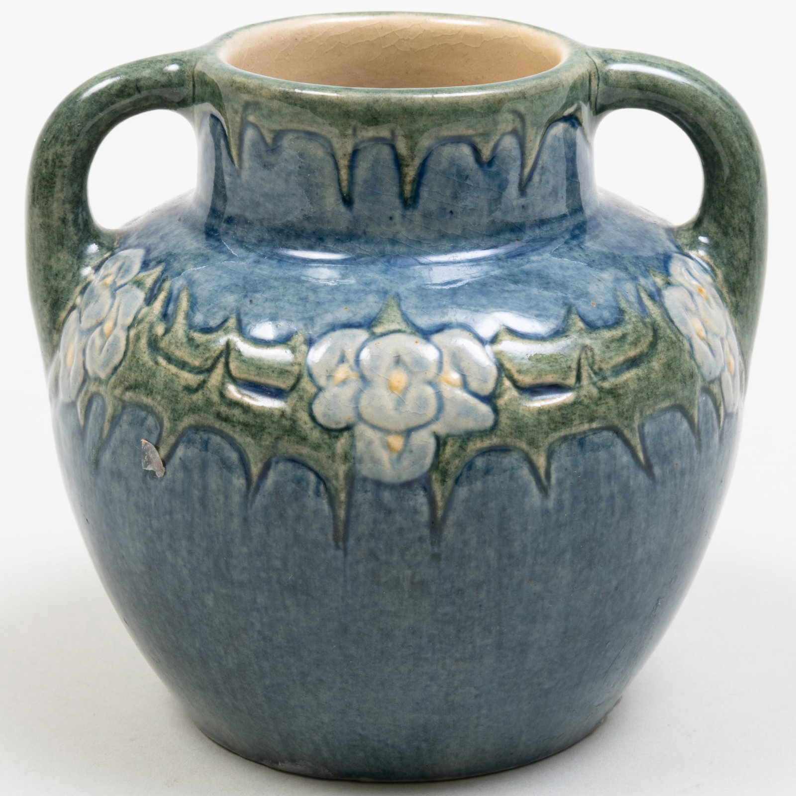 Newcomb College Pottery Two Handle Vase: Newcomb College Pottery Two Handle Vase Impressed mark and painted 'M. Morel'. 4 1/4 x 4 in. diam. Isak Lindenauer Antiques, San Francisco, 1995. The Collection of Ann and Gordon Getty.