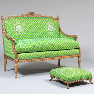 Louis XVI Style Giltwood Settee: Louis XVI Style Giltwood SetteeTogether with a Louis XV Style Giltwood Tabouret, Modern.41 x 4 ft. 3 1/2 in. x 27 1/2 in. seat height 21 in. (settee).7 1/4 x 18 1/2 x 18 1/2 in. (tabouret).The Estate