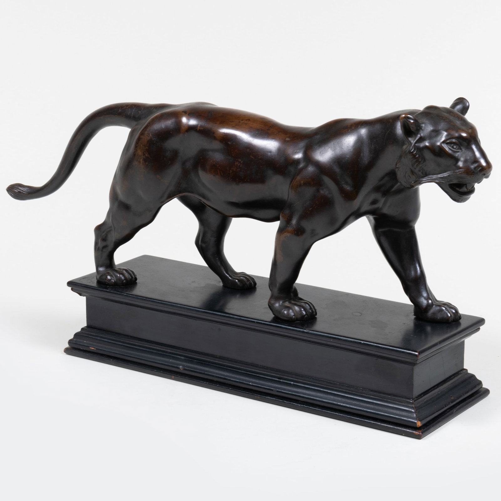Bronze Model of a Panther: Bronze Model of a Panther On an ebonized wood base. 9 1/2 x 14 x 4 1/2 in.