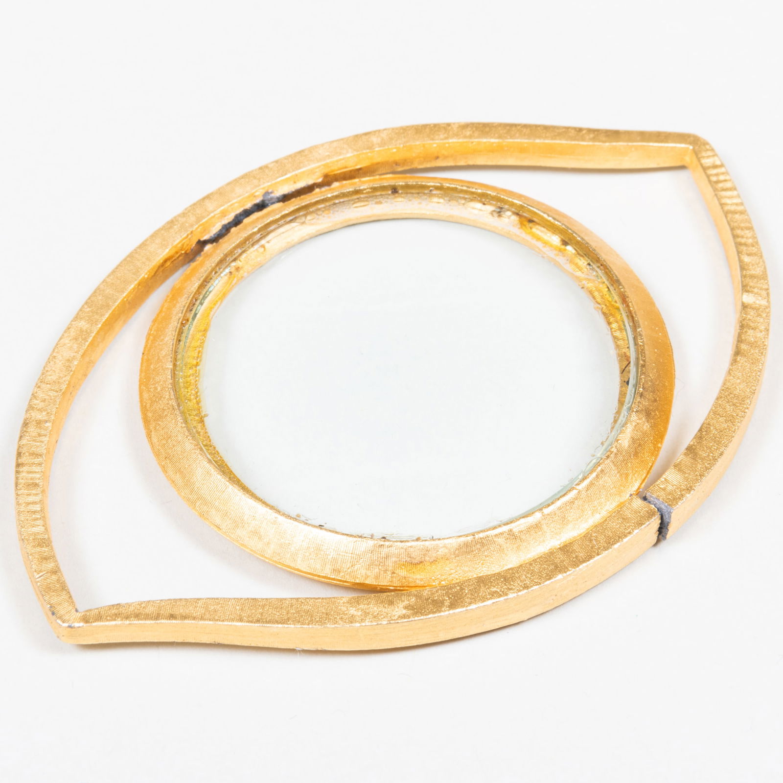 Gilt-Metal Magnifying Glass, After Jean Cocteau: Gilt-Metal Magnifying Glass, After Jean Cocteau 2 3/4 x 4 in.
