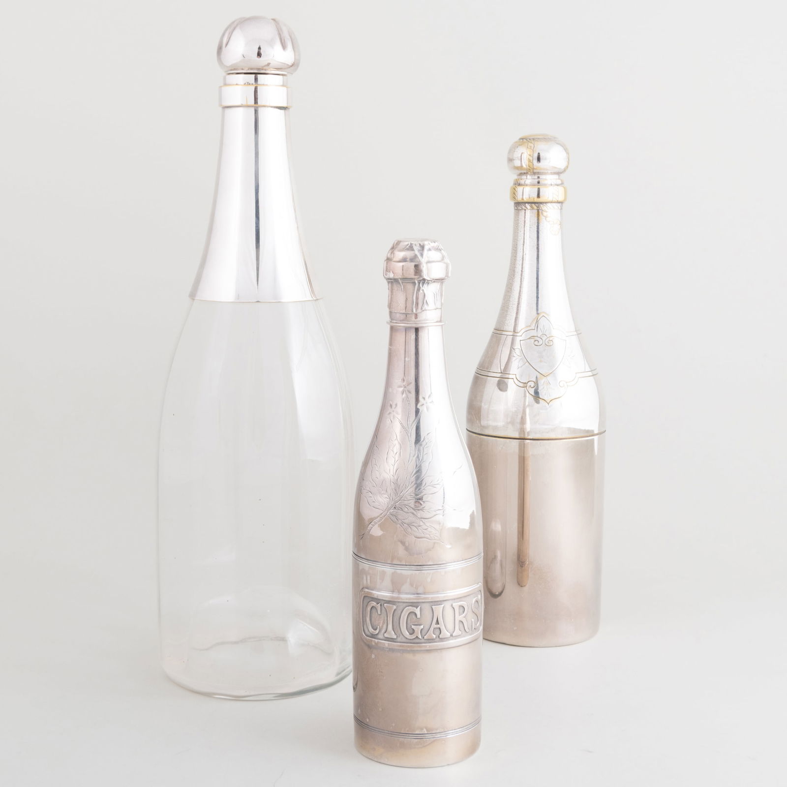 Three Silver Plate Champagne Bottle Form Wares (1 of 12)