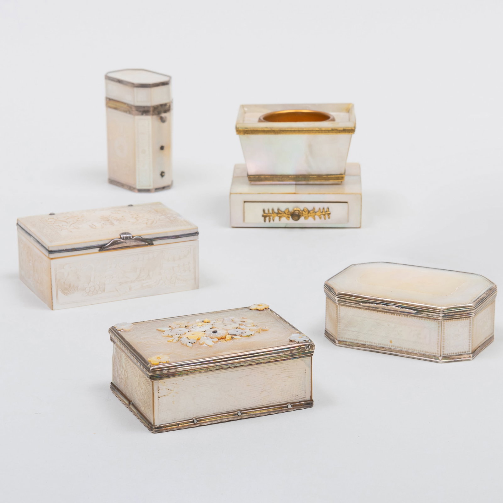 Group of Mother-of-Pearl Boxes and Table Accessories: Group of Mother-of-Pearl Boxes and Table Accessories Comprising: An inkstand A box decorated with squirrels A box with applied bouquet A tall box with canted corners A box with canted corners and flow