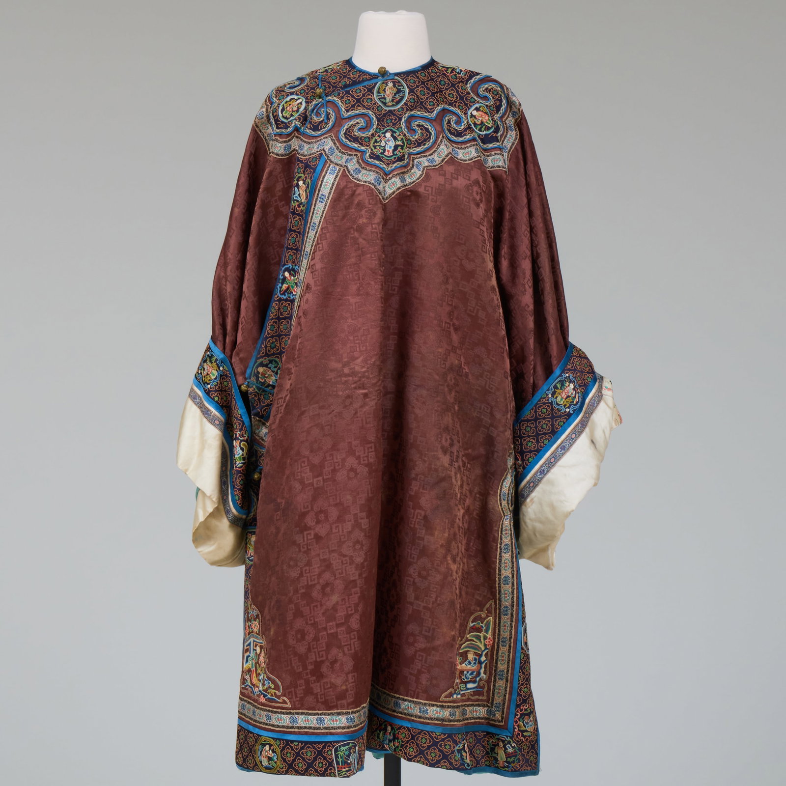 Chinese Brown Silk Damask Informal Robe and a Silk Velvet Brocade Panel: Chinese Brown Silk Damask Informal Robe and a Silk Velvet Brocade Panel The robe 38 in. long, the panel 42 1/2 x 43 in. Property from the Moke Mokotoff Collection