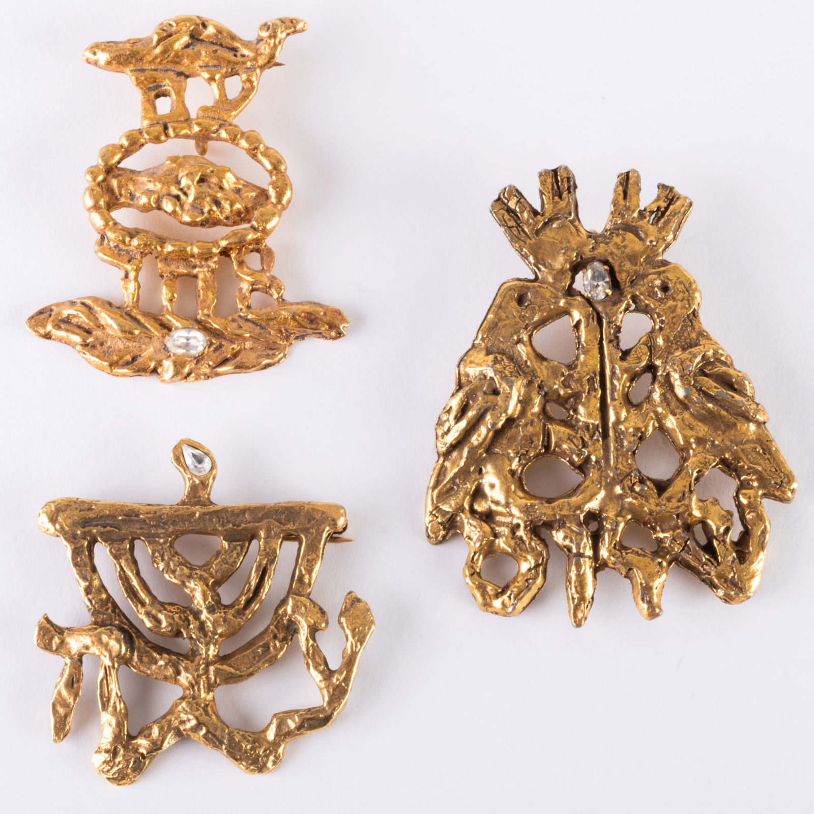 Three Jacques Lipchitz Gilt-Metal Brooches: Three Jacques Lipchitz Gilt-Metal Brooches All three signed Lipchitz on the back. Smallest 2 x 2 1/8 in., largest 3 x 2 1/4 in.