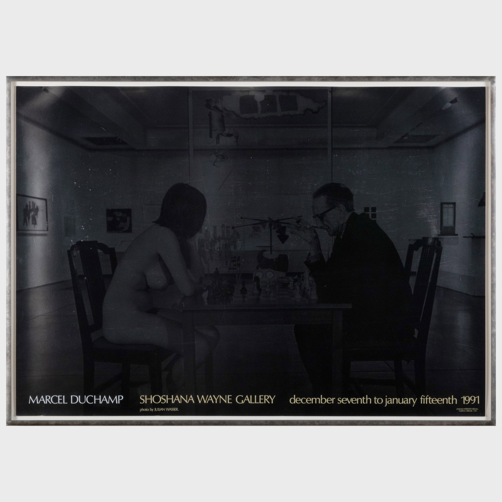 After Julian Wasser (1933-1923): Marcel Duchamp Playing Chess With a Nude Eve Babitz: After Julian Wasser (1933-1923): Marcel Duchamp Playing Chess With a Nude Eve Babitz Offset poster, 1991. 24 1/2 x 35 in. (sheet), 26 x 35 1/2 in. (frame). The Collection of Gordon and Zanne Stewart.