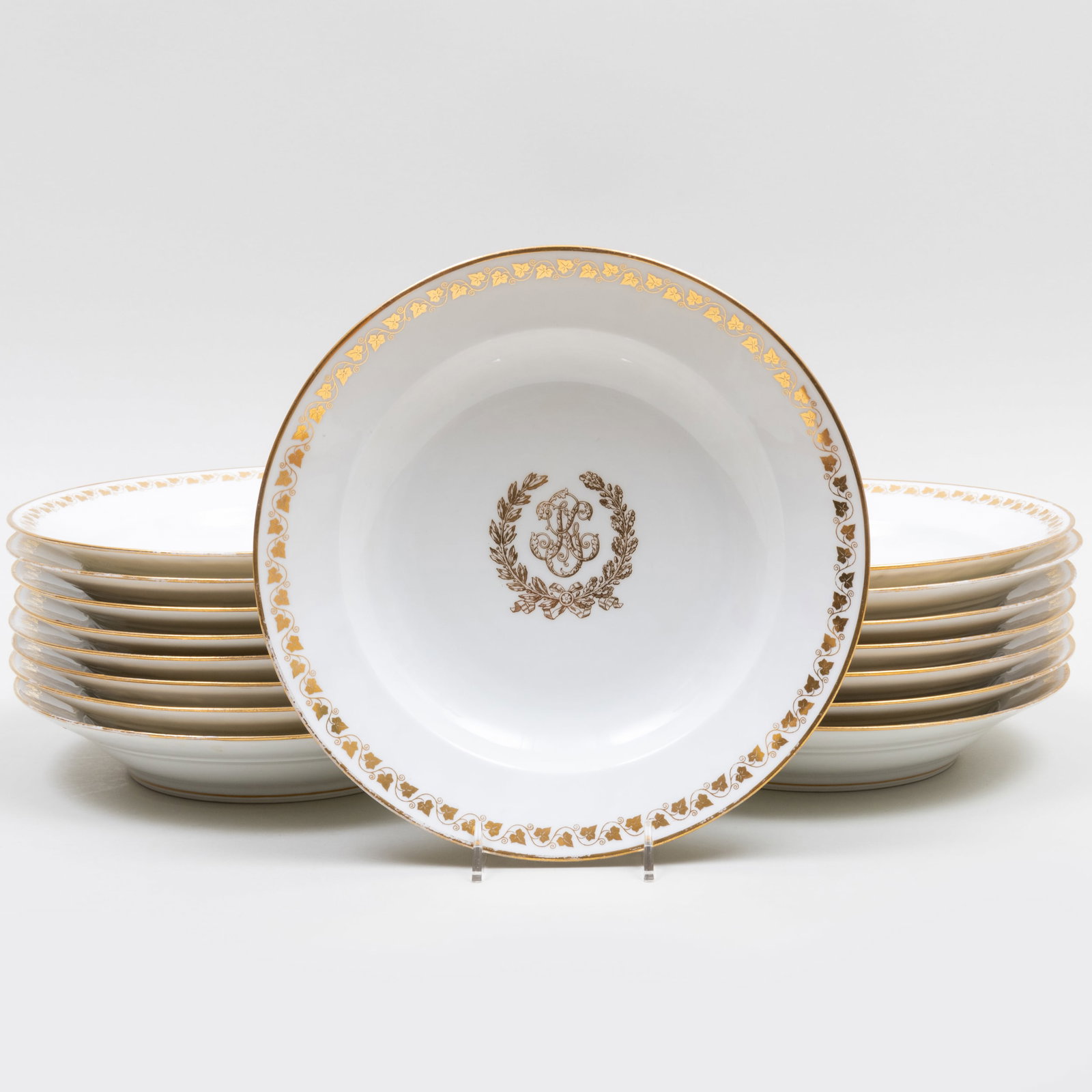 Set of Sixteen Sevres Style Gilt Decorated Porcelain Soup Plates: Set of Sixteen Sevres Style Gilt Decorated Porcelain Soup Plates Spurious printed marks. 9 1/2 in. diam. Property from the Collection of James Grafstein