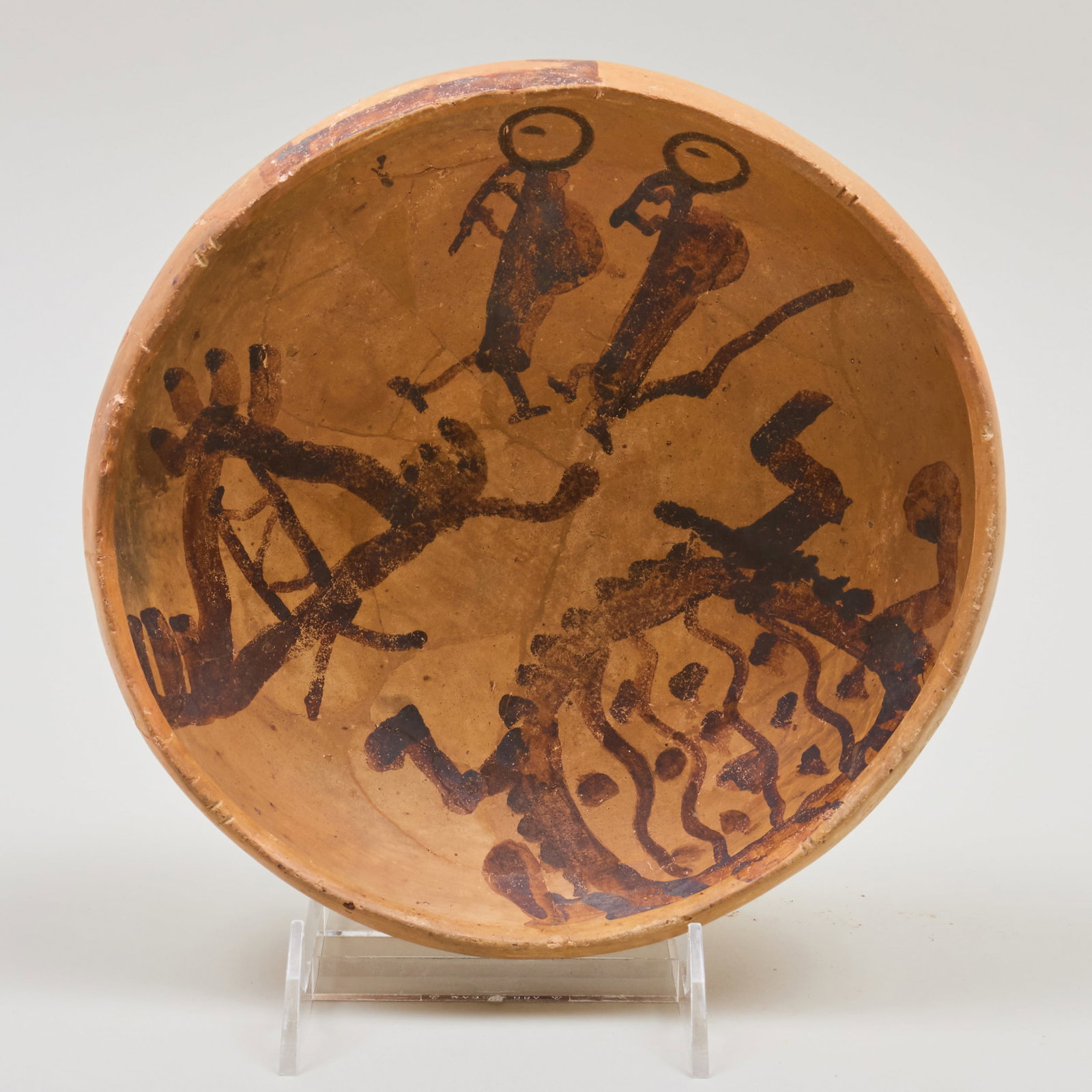 Jeddito Yellow and Black Shallow Bowl with Kokopelli, Tortoise and Figures: Jeddito Yellow and Black Shallow Bowl with Kokopelli, Tortoise and Figures 3 x 9 1/2 in. diam. By repute Gene Lang, Littleton, CO, 1995. The Collection of Gordon and Zanne Stewart.