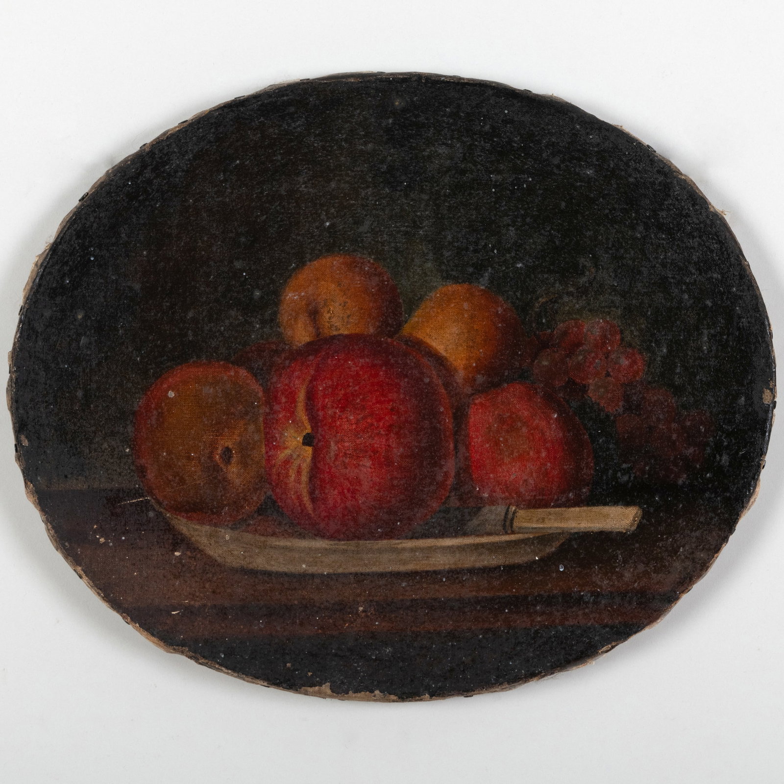 American School: Still Life with Fruit: American School: Still Life with Fruit Oil on canvas, unsigned, lined. 14 x 17 in. (oval), unframed. The Collection of Dorothy Tapper Goldman.