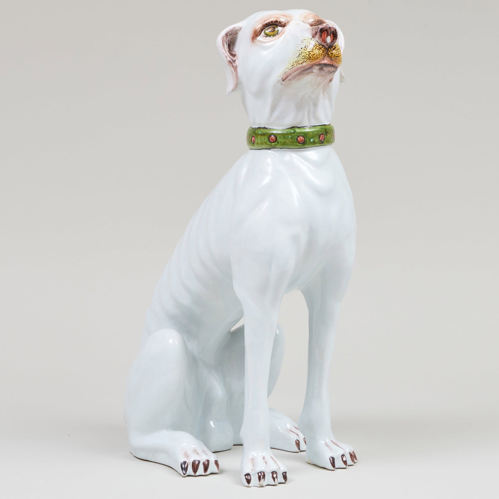 Italian Faience Model of a Seated Hound: Italian Faience Model of a Seated Hound Black painted mark. 19 x 14 x 8 in.