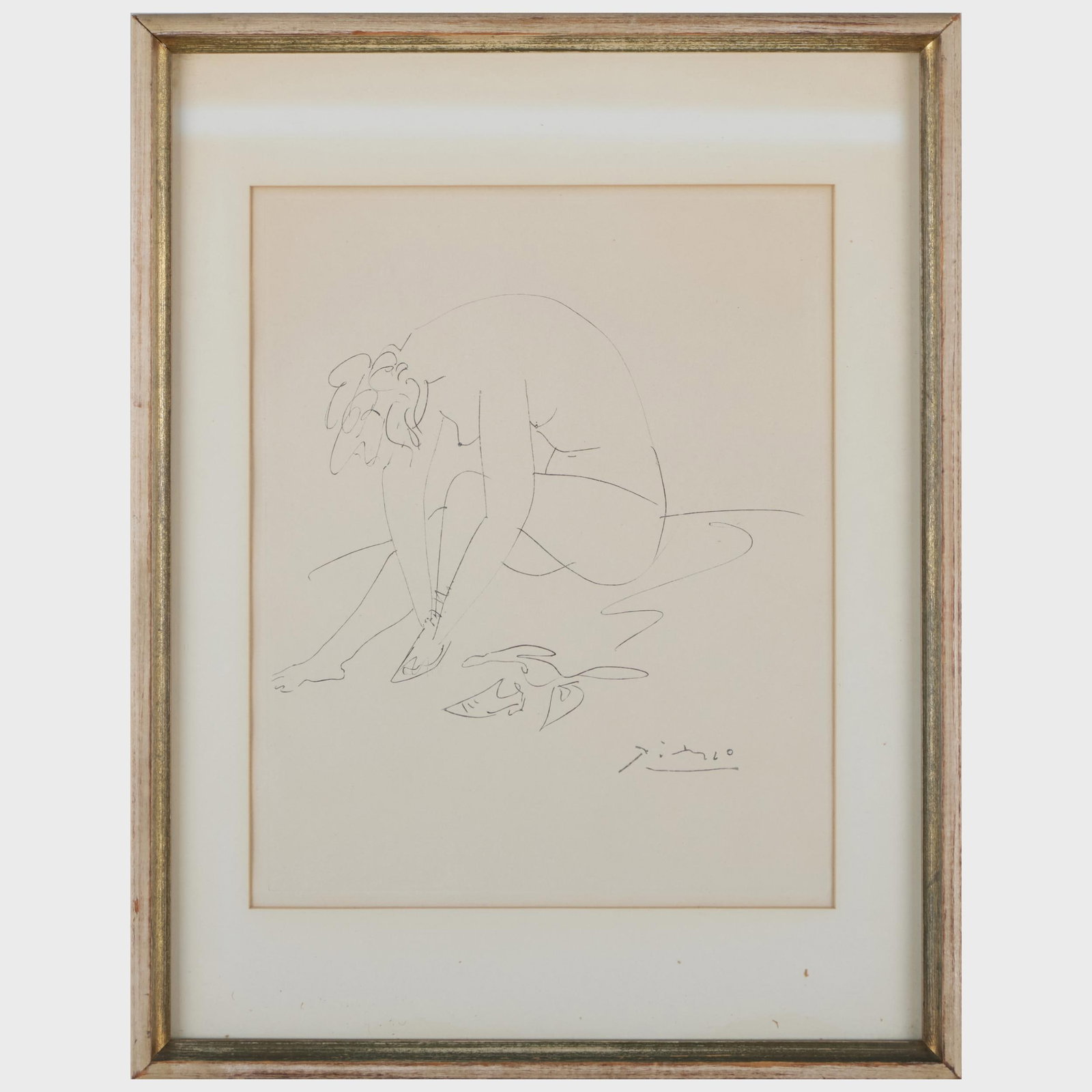 After Pablo Picasso (1881-1973): Nude Tying Her Shoe: After Pablo Picasso (1881-1973): Nude Tying Her Shoe Etching in black on wove paper, with the stamped signature. 16 1/8 x 11 3/4 in. (sheet), 19 5/8 x 15 in. (frame).
