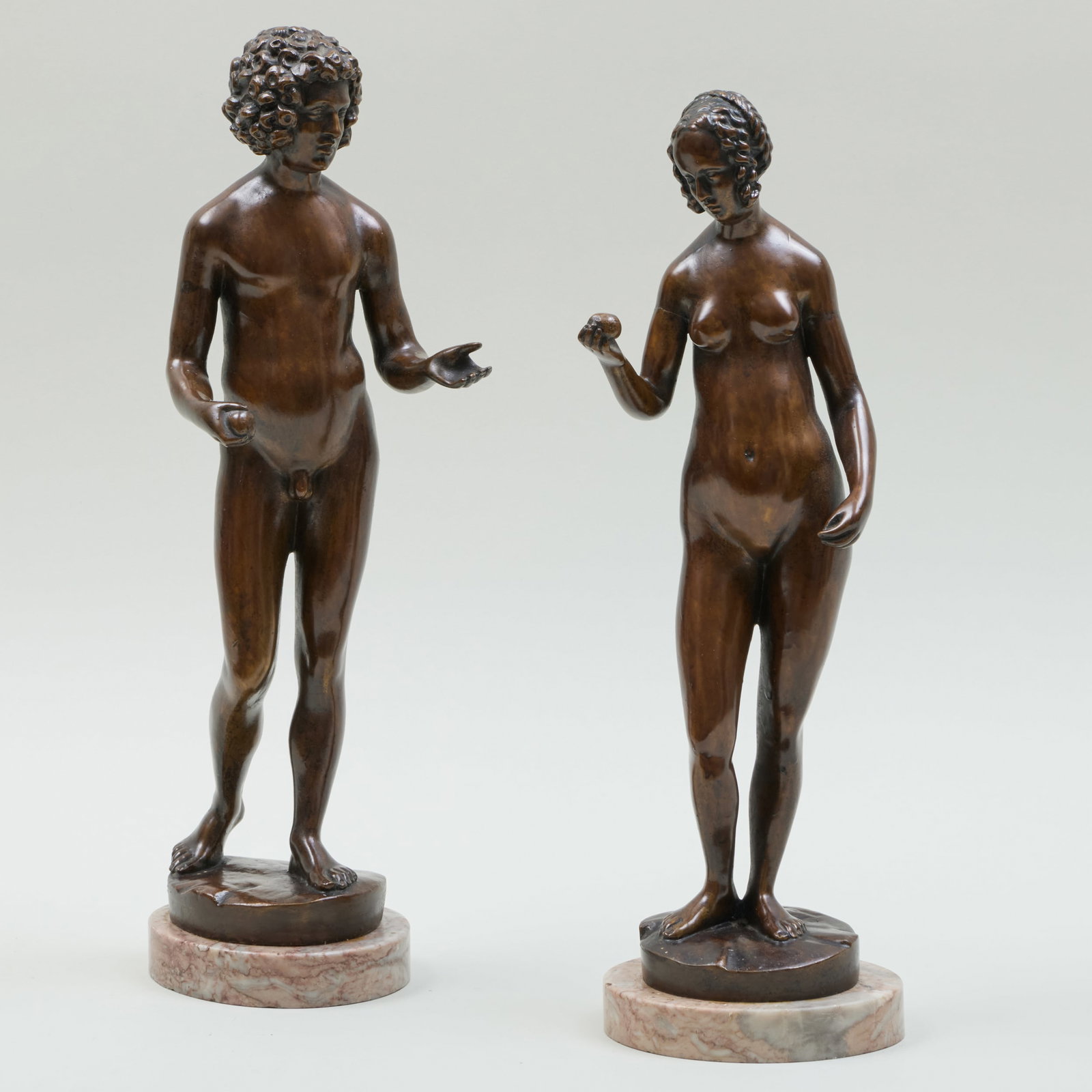 Pair of Continetal Bronze Models of Adam and Eve: Pair of Continetal Bronze Models of Adam and Eve Two bronze on marble bases, Eve signed 'Micheli' lower back, Adam signed 'Michali' lower back. 15 3/4 in. (height with base), 14 1/2 (height with base)