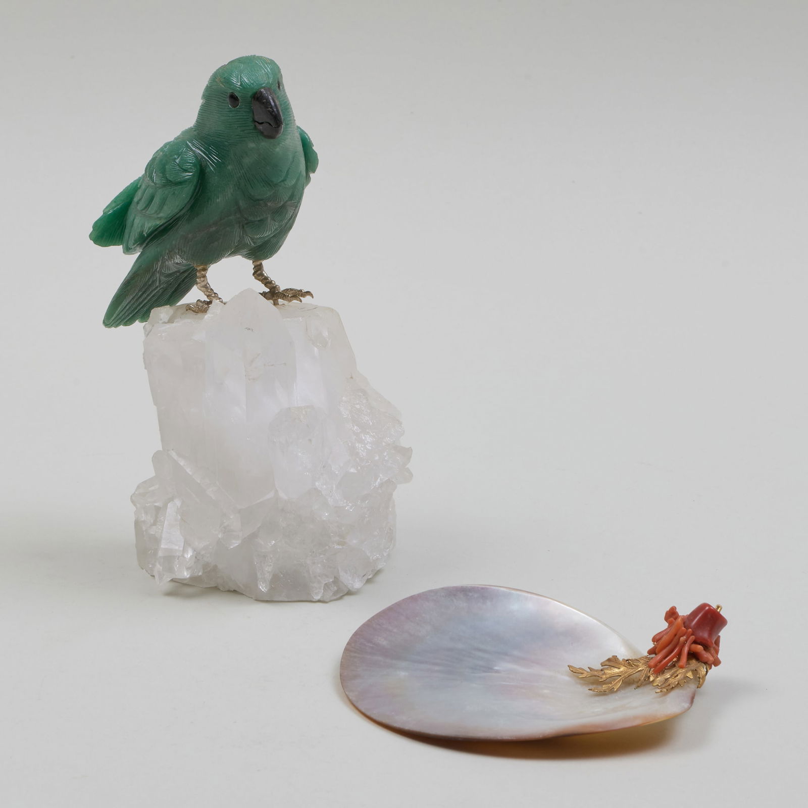 Hardstone Model of a Parrot and a Coral Mounted Shell Dish: Hardstone Model of a Parrot and a Coral Mounted Shell Dish The parrot 6 3/4 x 4 x 3 1/4 in., the dish 4 1/2 x 4 1/2 in. The Collection of Henri Charles Veit, Lyme, CT