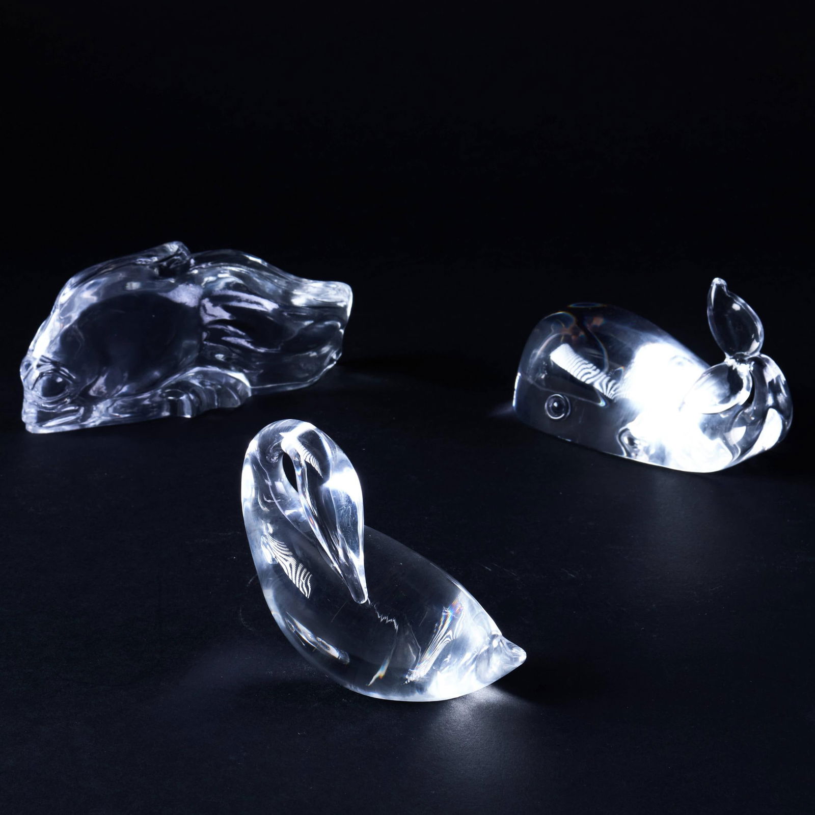 Group of Three Steuben Glass Animal Figures: Group of Three Steuben Glass Animal Figures Etched marks. Comprising: A fish A preening goose, A whale The fish 6 x 3 in.