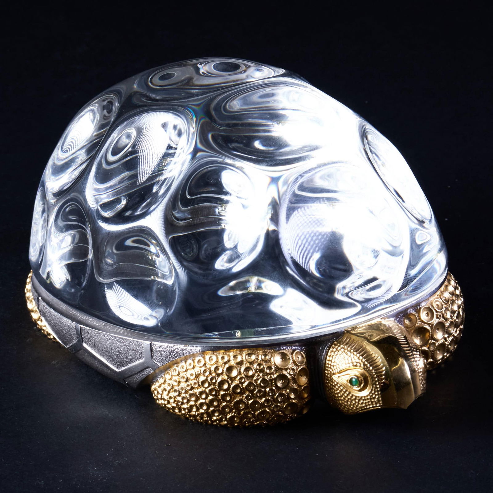 Steuben Glass and Silver-Gilt Model of a Turtle: Steuben Glass and Silver-Gilt Model of a Turtle Etched mark, inset with emerald eyes, mount marked 'Sterling' and 'Steuben', designed by Paul Schulze and introduced 1969. 2 3/4 x 4 x 5 1/2 in.