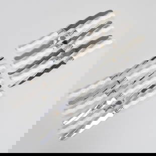 Set of Twelve English Porcelain Handled Dinner Knives and Twelve Lunch Knives, After Syrie Maugham: Set of Twelve English Porcelain Handled Dinner Knives and Twelve Lunch Knives, After Syrie Maugham The dinner knives 10 1/2 in. long, the lunch knives 9 in. long.