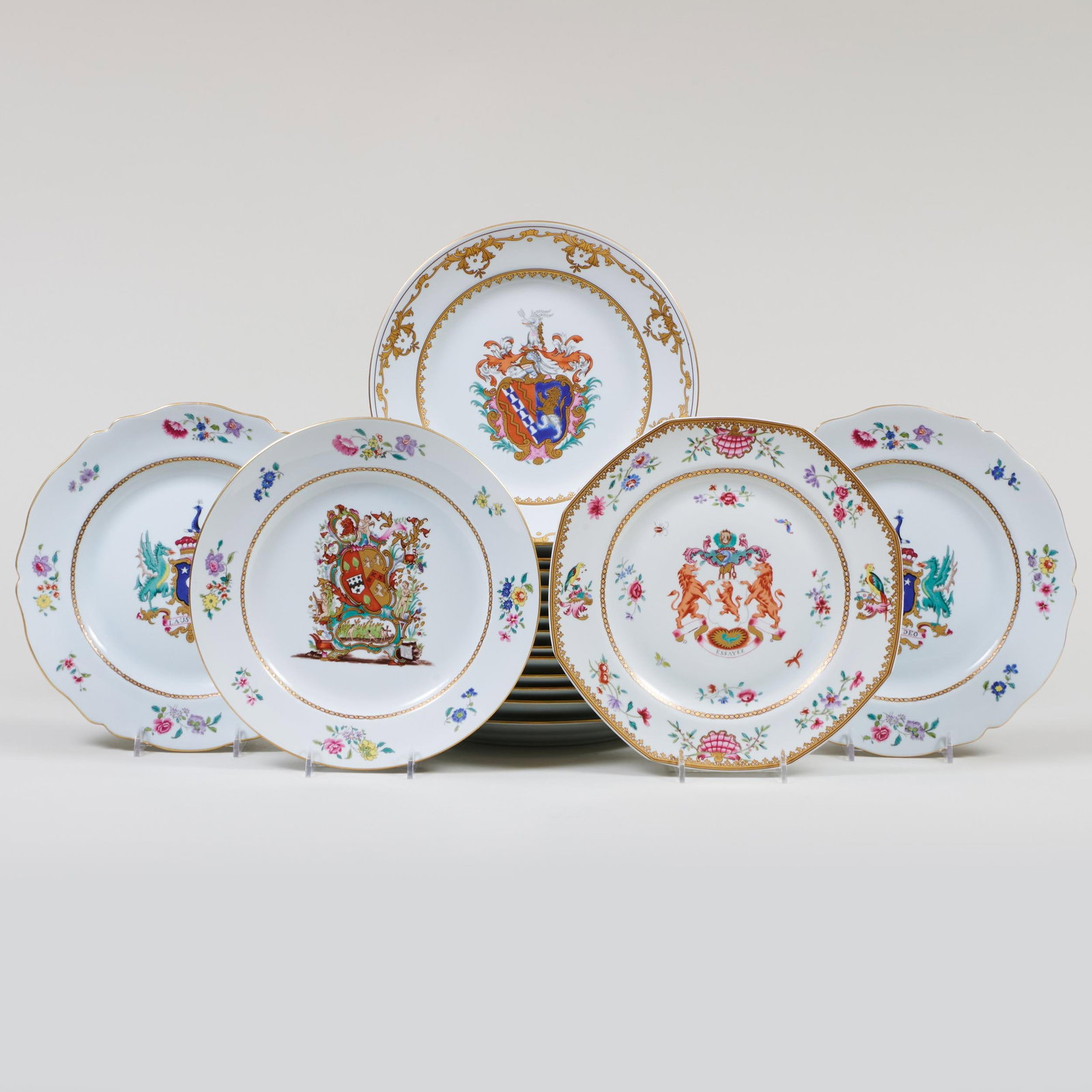 Sixteen Mottahedeh Porcelain Armorial Plates: Sixteen Mottahedeh Porcelain Armorial Plates Printed marks. Together with four other Mottahedeh porcelain plates in various patterns. The Armorial plates 9 in. diam., (20 pcs). Property from the Estat