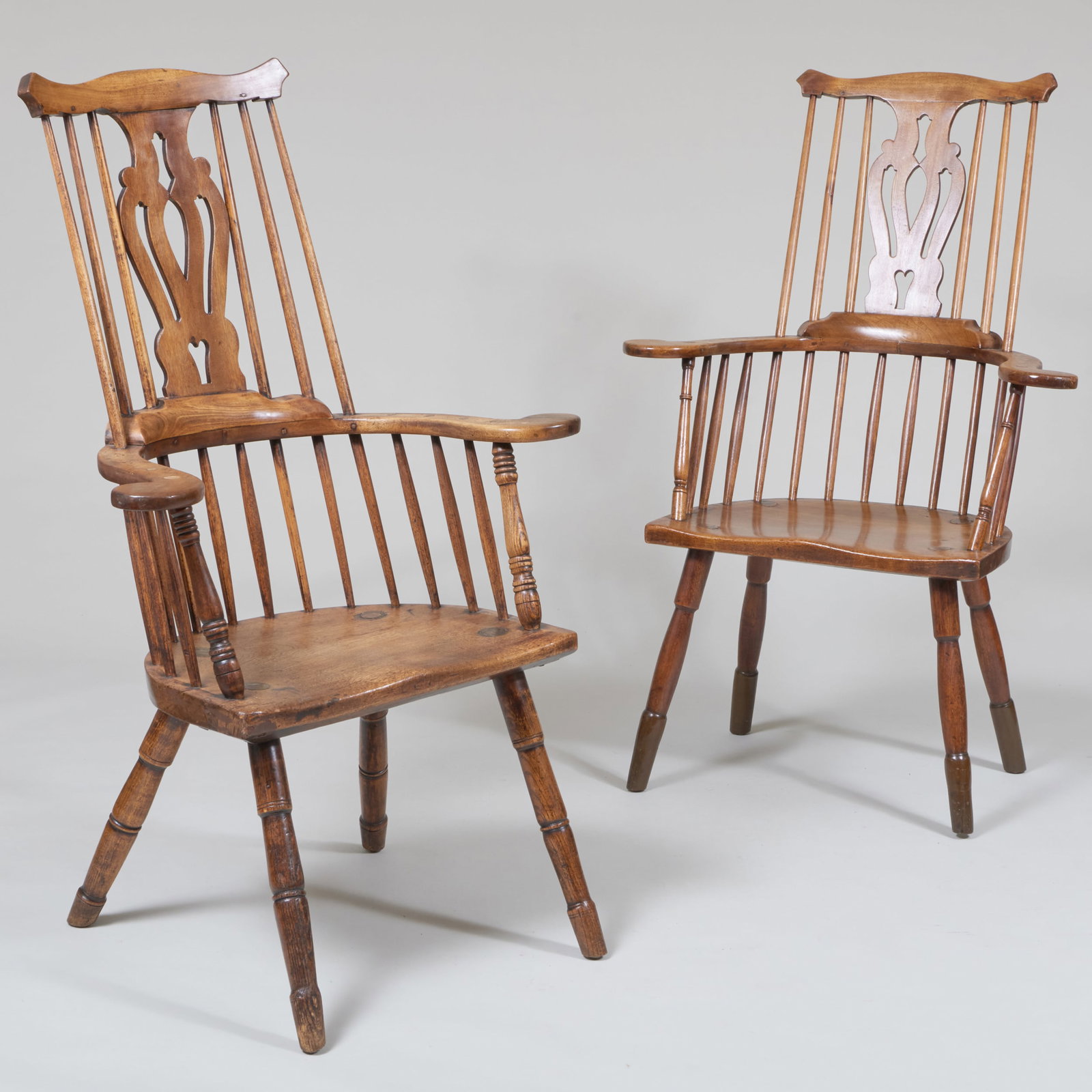 Near Pair of Tall Back Yew Wood Windor Chairs: Near Pair of Tall Back Yew Wood Windor Chairs 45 x 30 x 23 in., seat height 17 1/4 in. 45 1/4 x 29 1/2 x 22 3/4 in., seat height 17 in. The Private Collection of Mindy Papp, Bedford, NY.